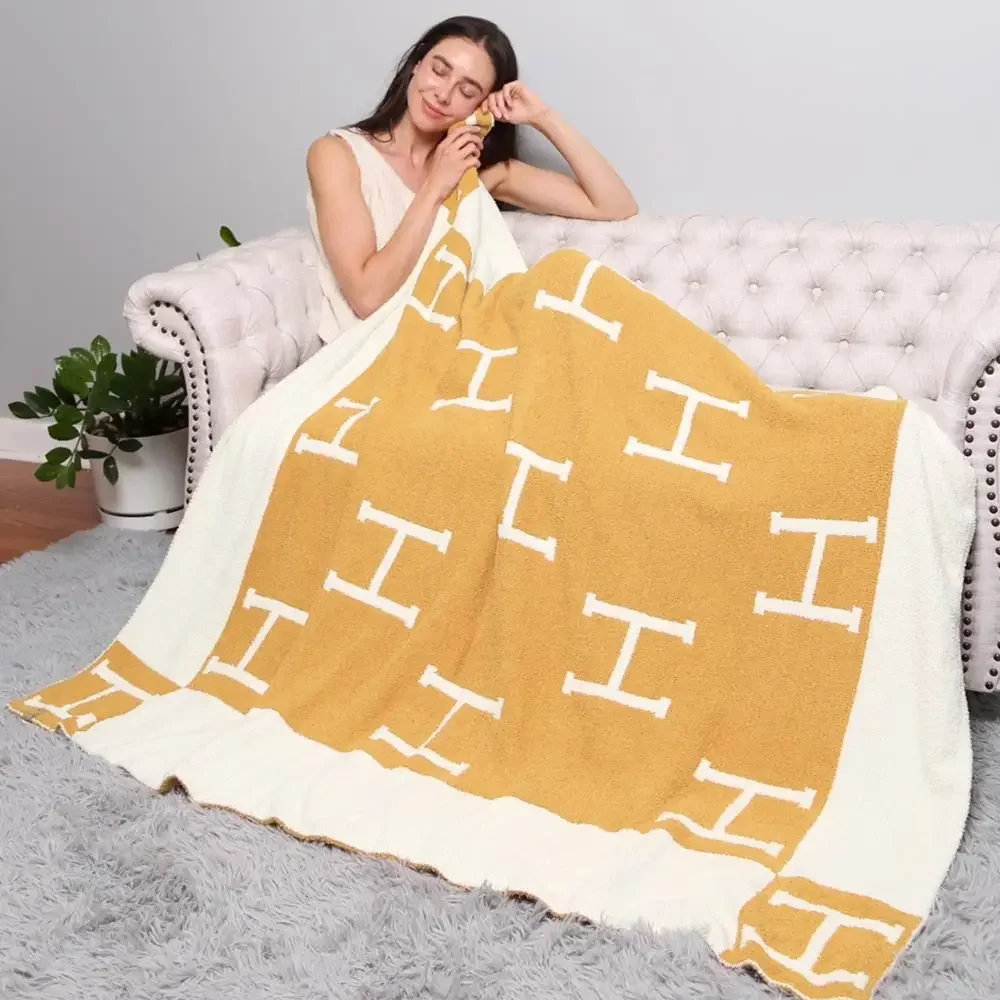 hermes blanket mustard.webp