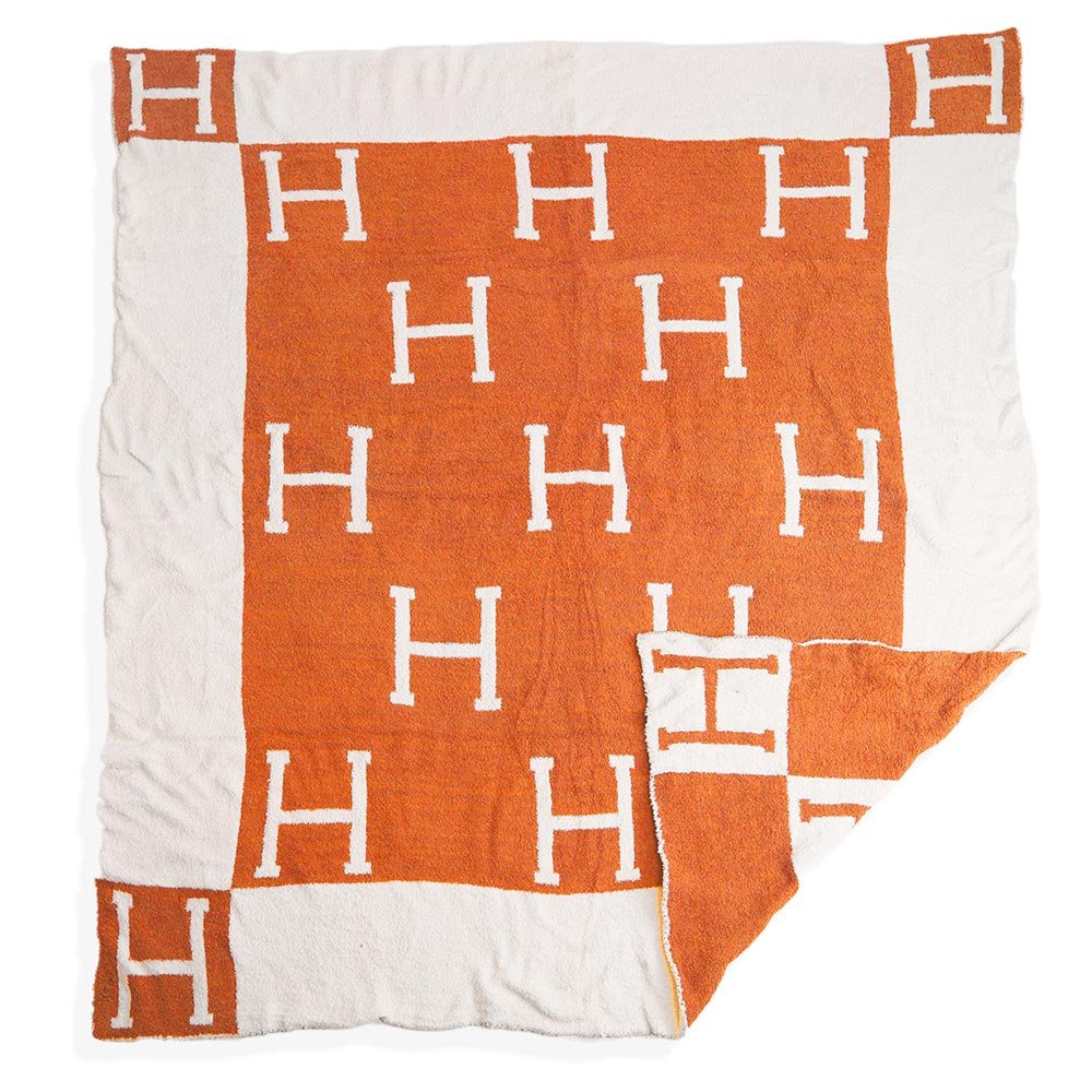 hermes blankey orange.jpeg