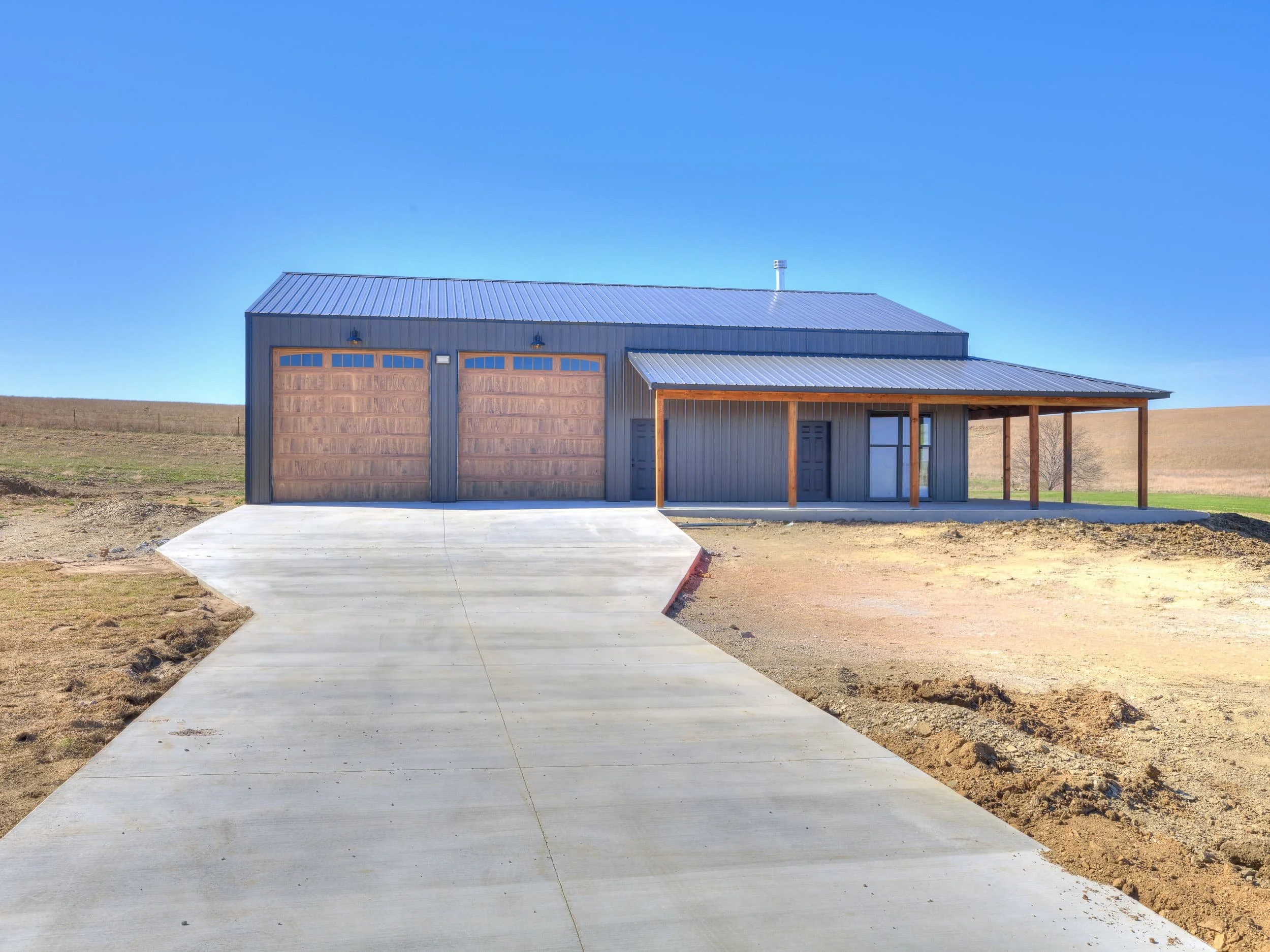 Owasso Custom Homes | Sandstone Barndominium 1