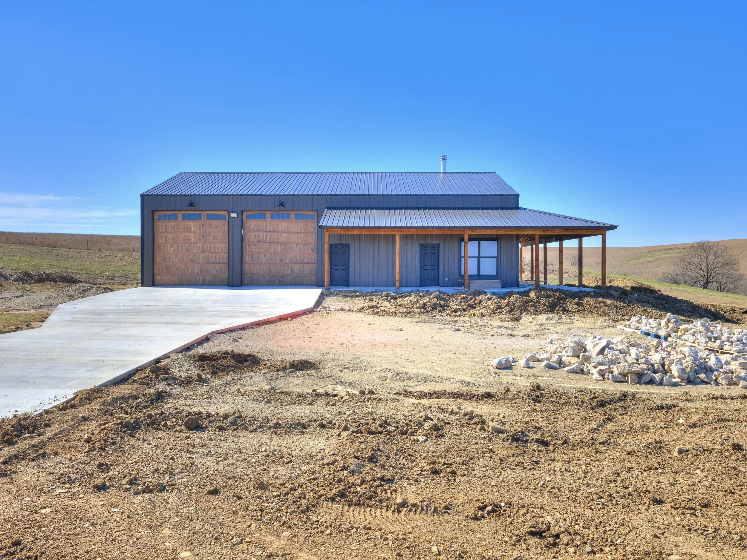 Owasso Custom Homes | Sandstone Barndominium 1