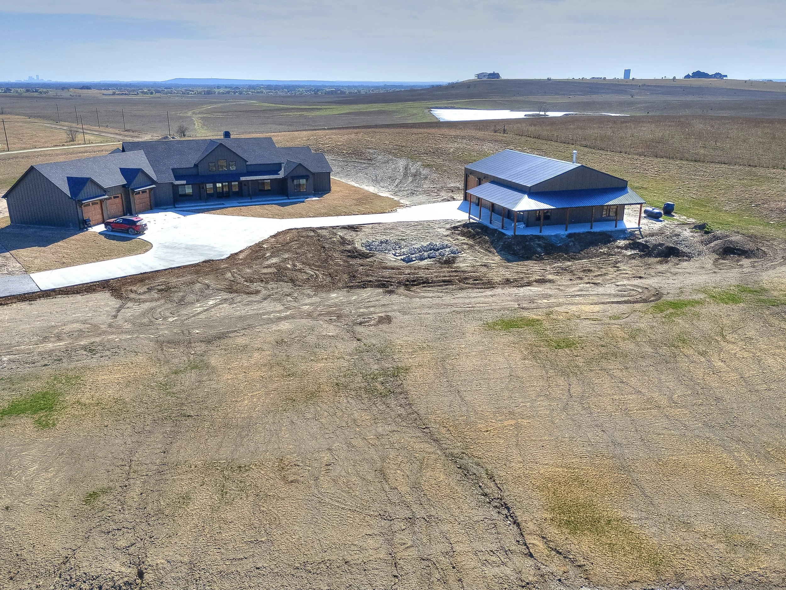 Owasso Custom Homes | Sandstone Barndominium 1