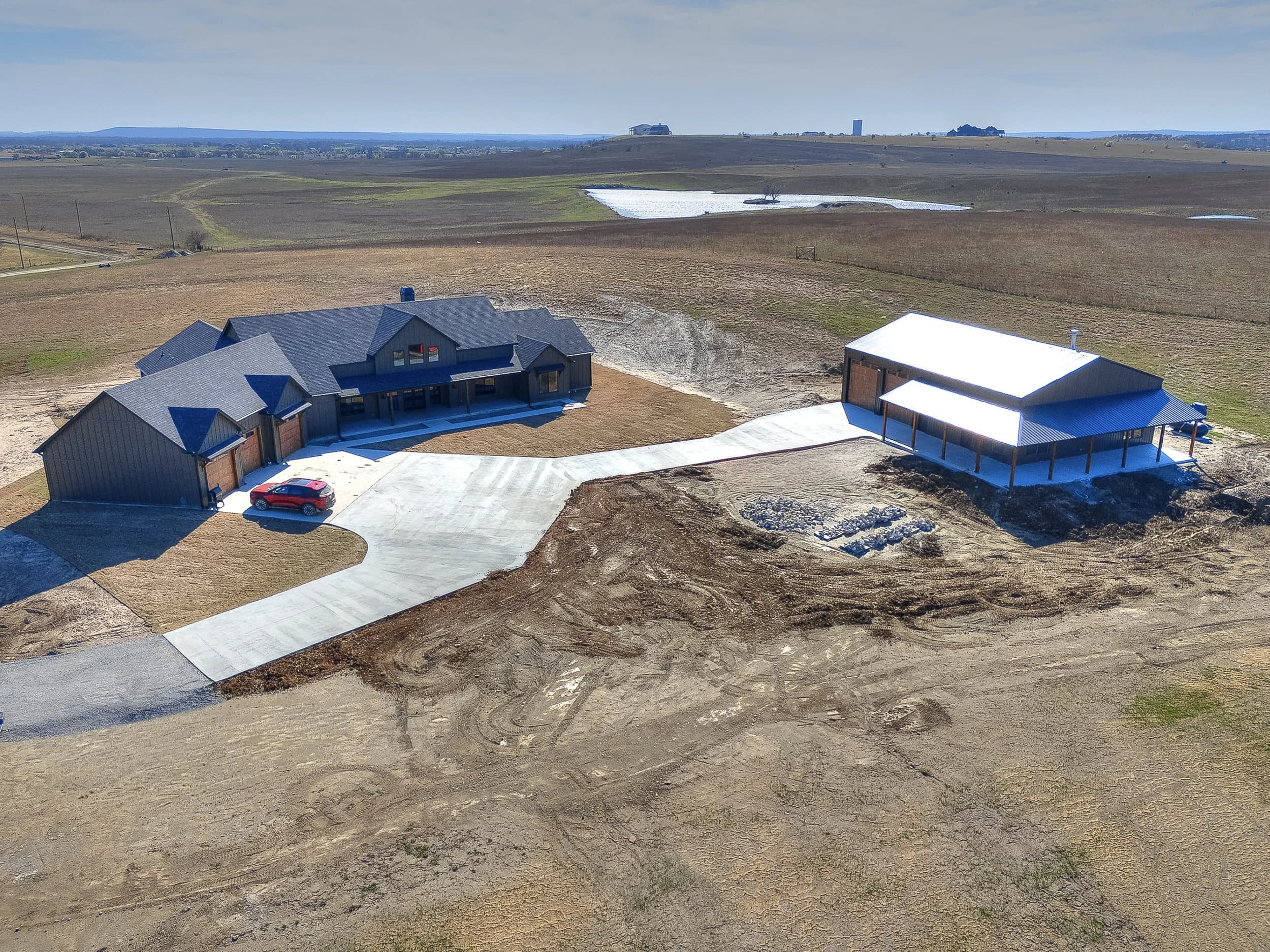 Owasso Custom Homes | Sandstone Barndominium 1