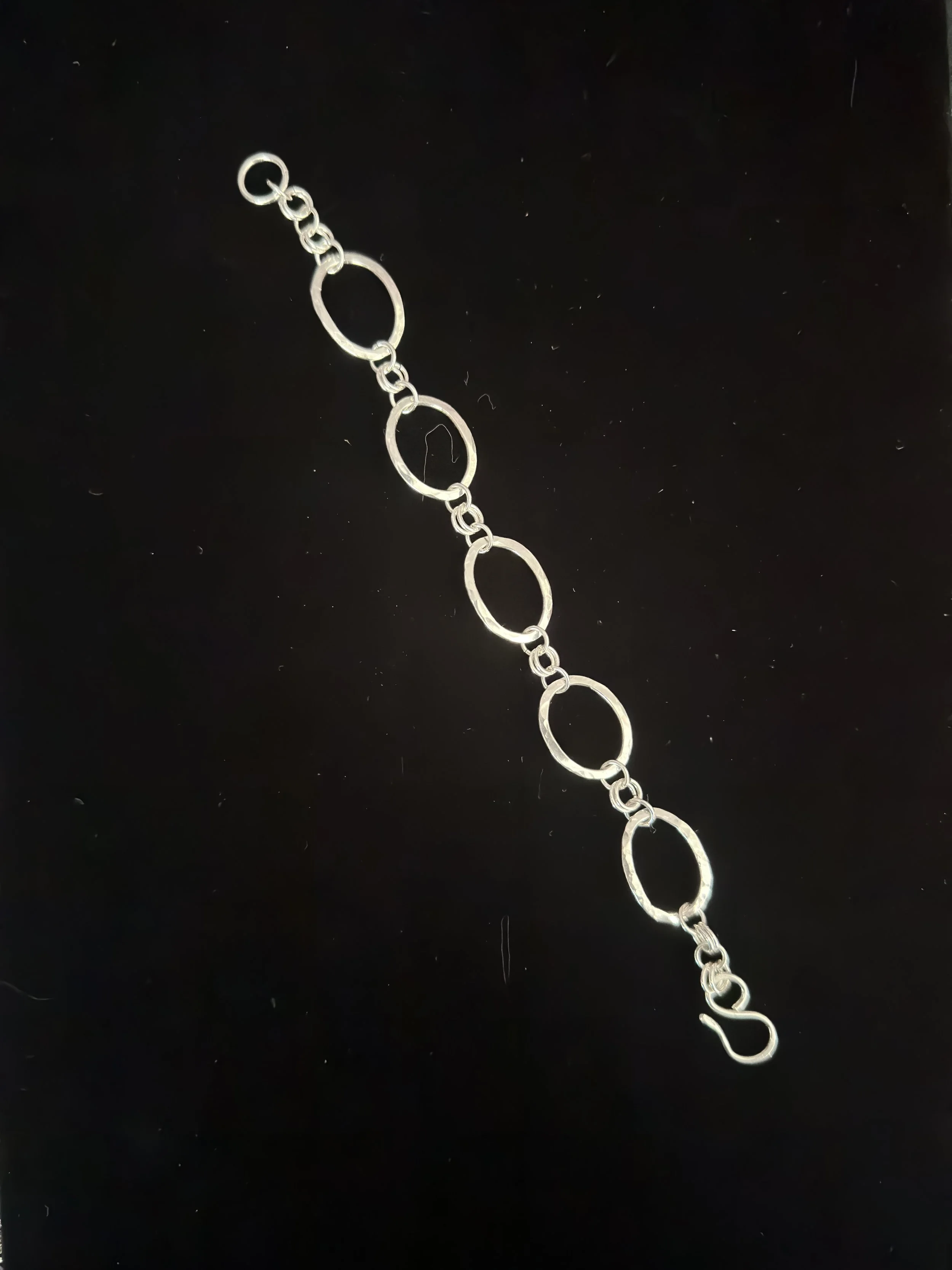 Hugging Oval Bracelet with Ring Clusters