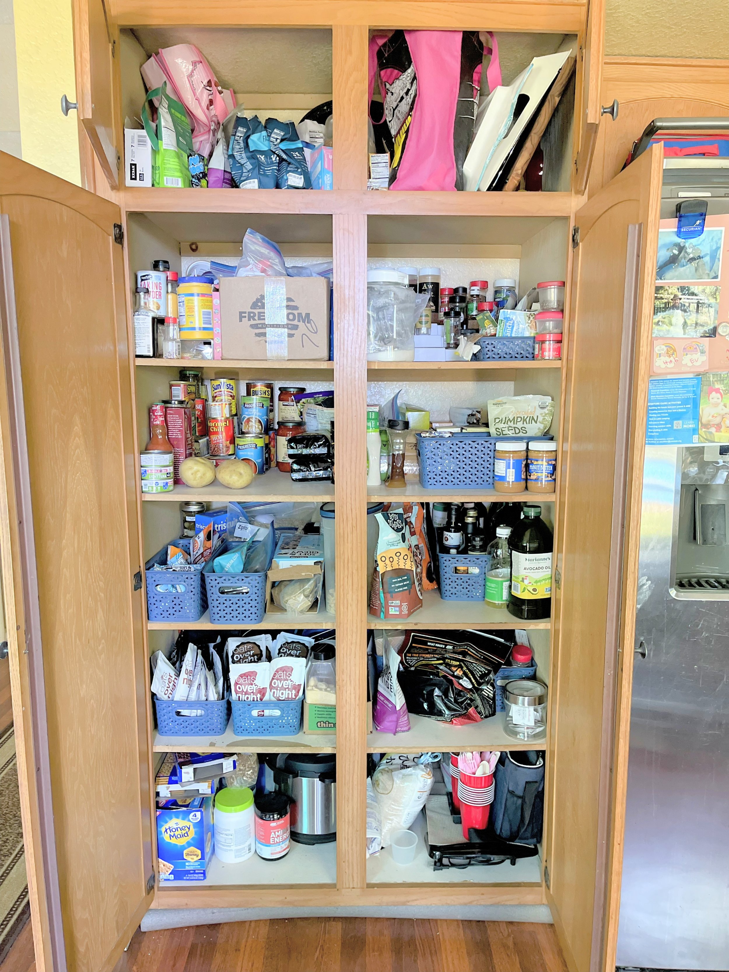 Before photo of a cluttered kitchen pantry in an Escondido, CA home by Fresh Start Organizing – messy shelves and disorganized food storage needing function and flow, professional home organizing services in San Diego
