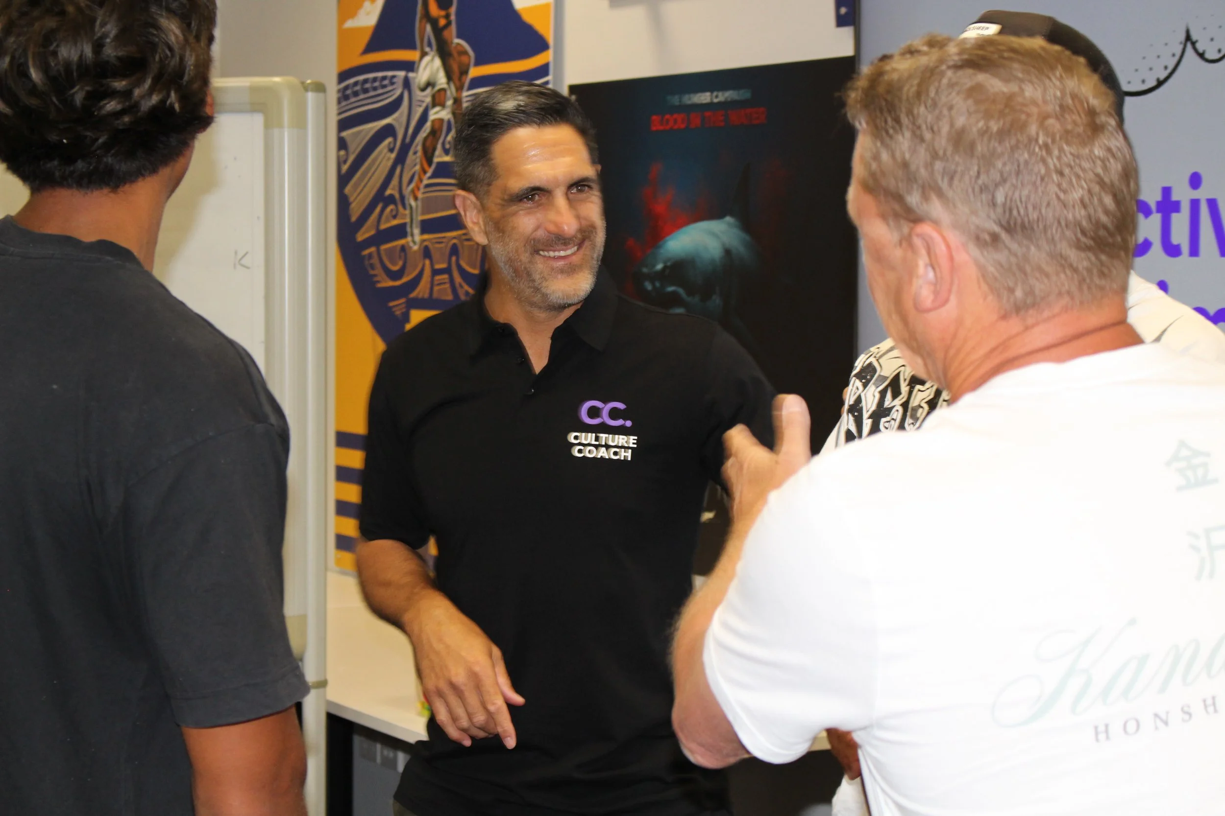 Chad Tuoro, Culture Coach NZ, in conversation with a leader during a coaching session