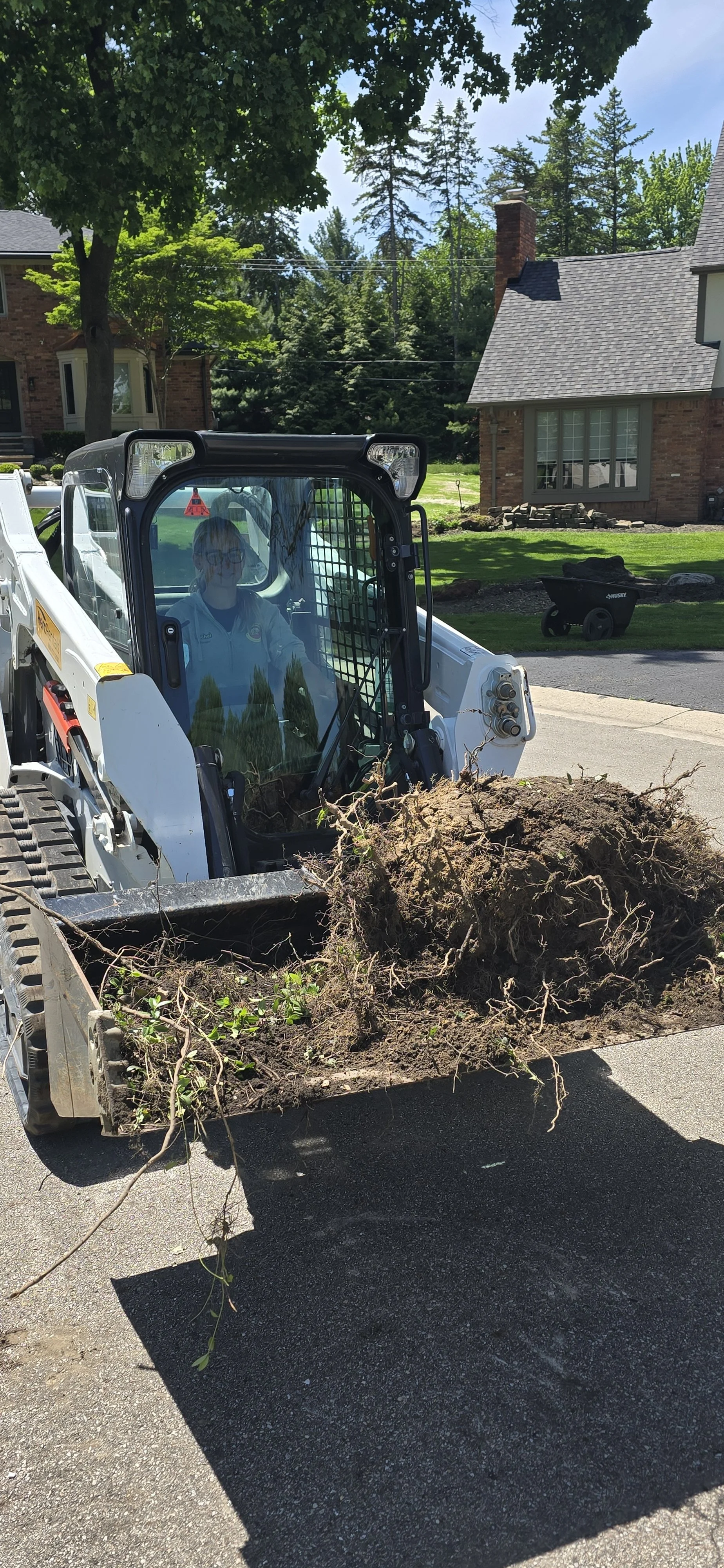 Ray Ray in the Skid Steer 4.jpg