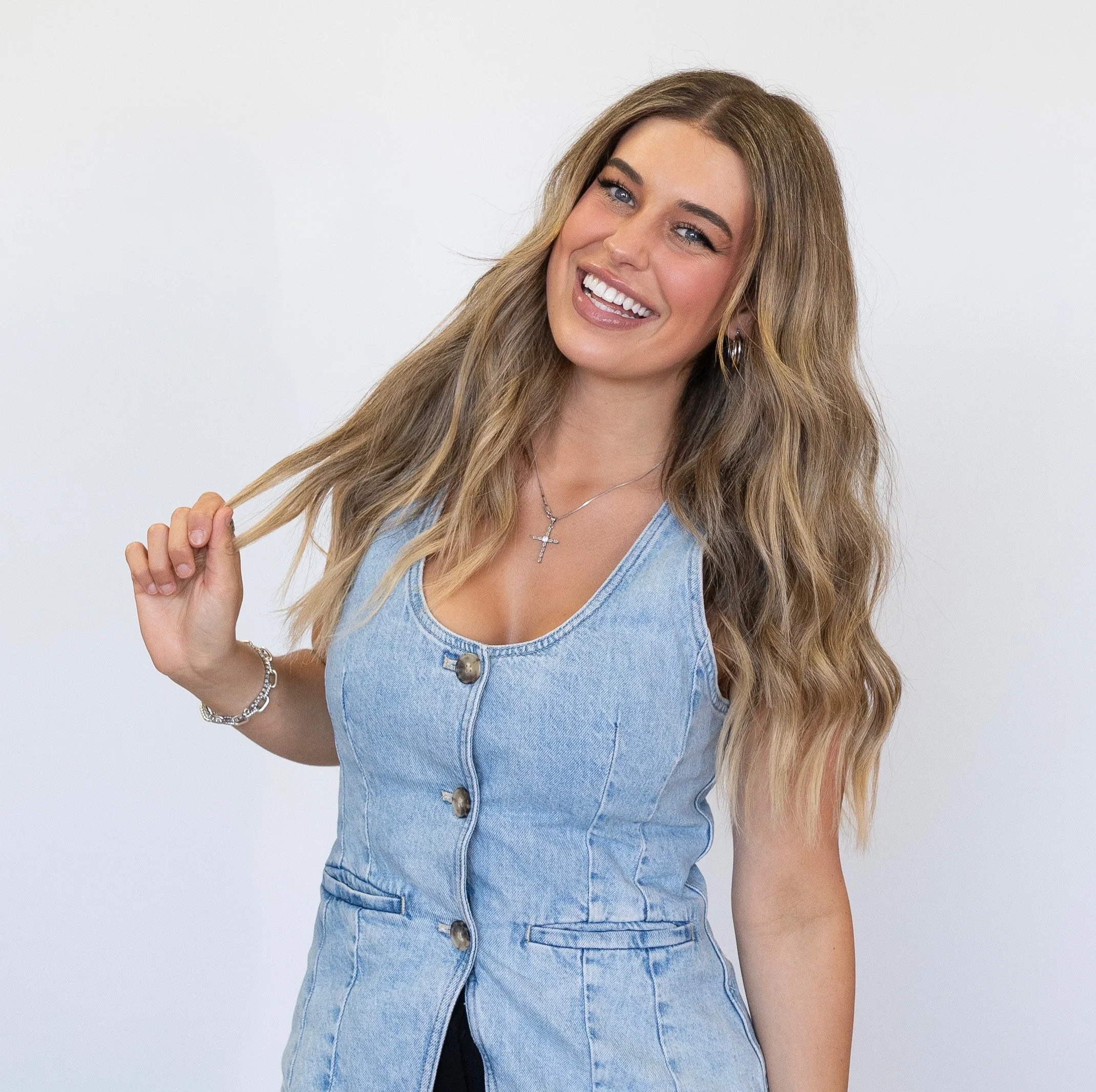 Anna Capri, owner and professional luxury hair stylist and extension specialist at Capri Salon in Franklin Tennessee