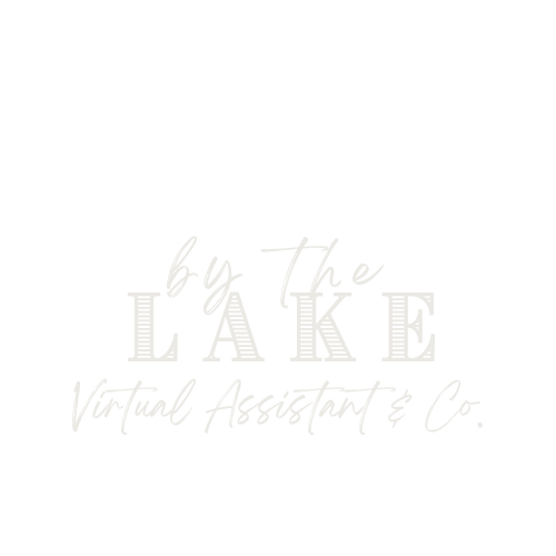 Logo for 'By The Lake Virtual Assistant & Co.' featuring a lighthouse, sunset, and clouds in a diamond shape on a black background.