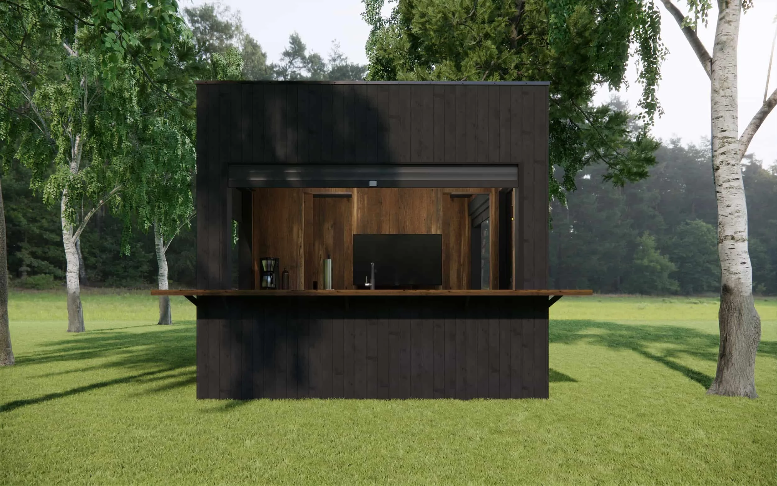 A modern outdoor kitchen with a black exterior and a wooden interior, situated in a grassy area with trees.
