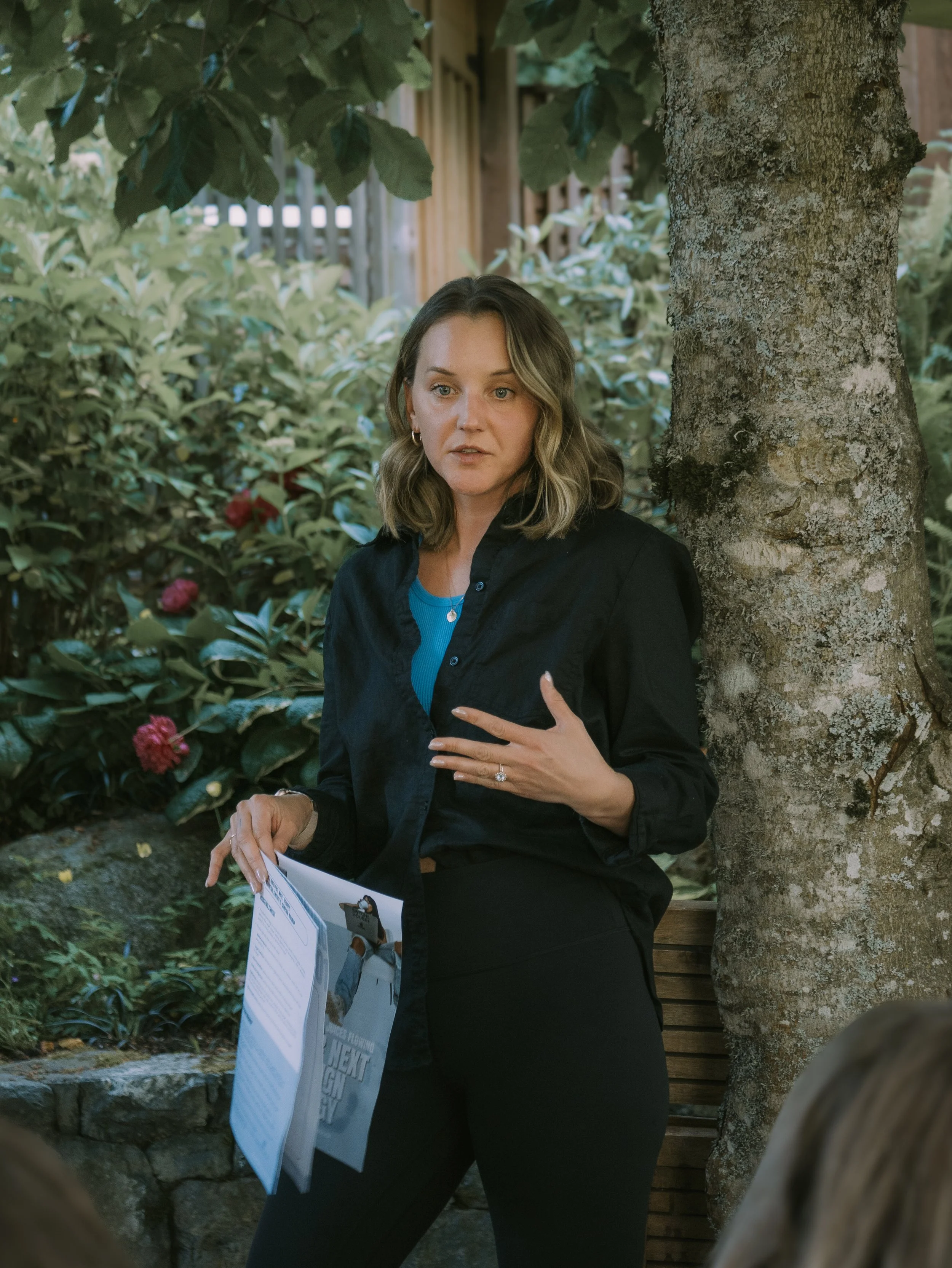 Robyn Kelly leading a marketing planning workshop at a Babes Build Community event, guiding women entrepreneurs through brand and business strategy.