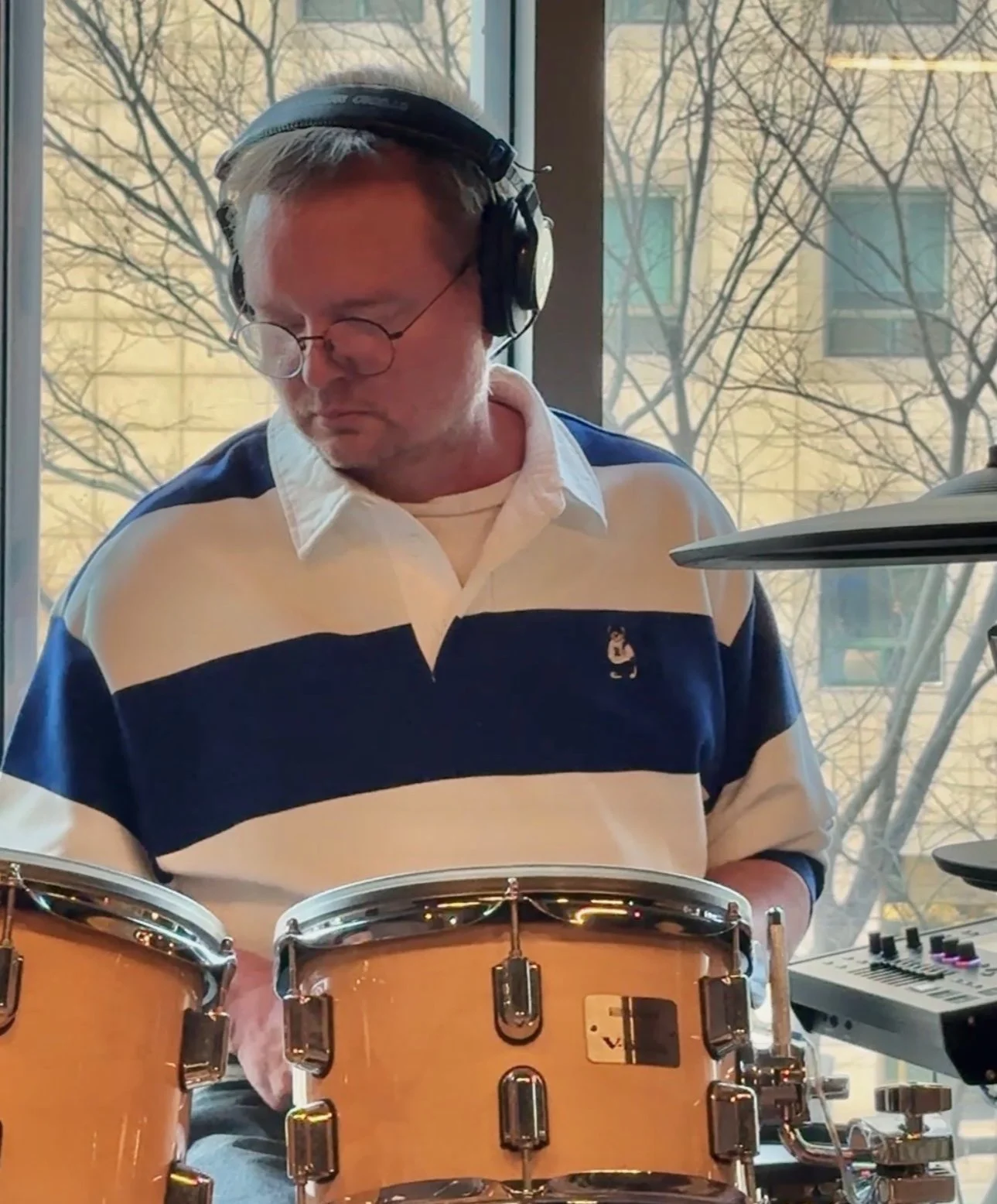 Melkije playing drums