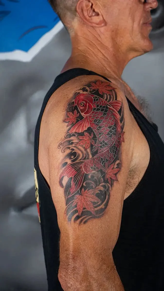 Social Animals tattoo β colour shoulder piece