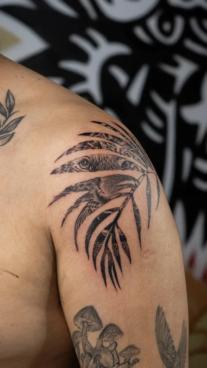Social Animals tattoo β ornamental shoulder