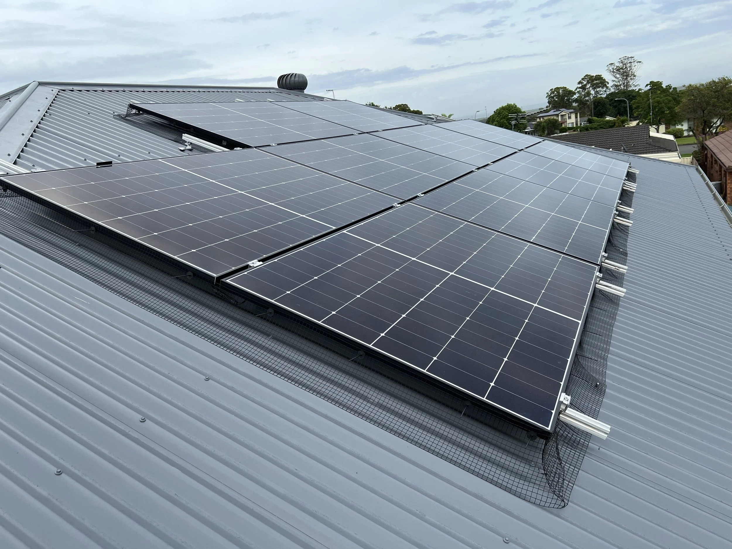 Solar panels installed on a metal rooftop
