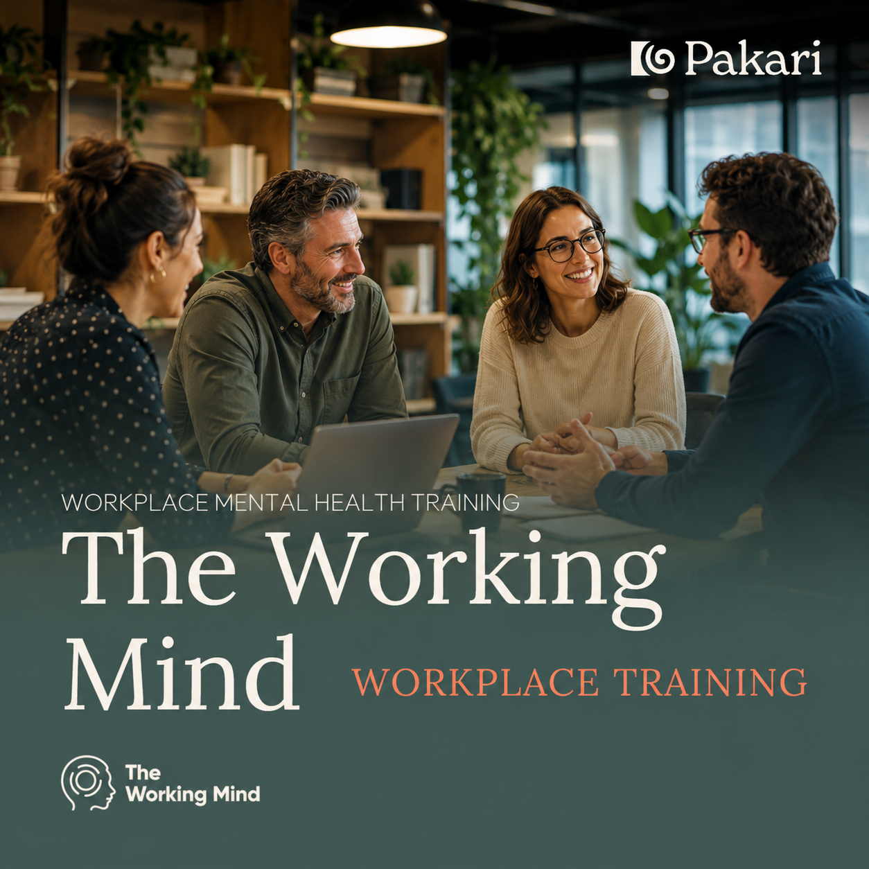 Four people sitting at a table in an office, engaged in conversation with a woman smiling and listening. Shelves with books and plants in the background. Overlaid text reads 'Workplace Mental Health Training: The Working Mind Workplace Training'.
