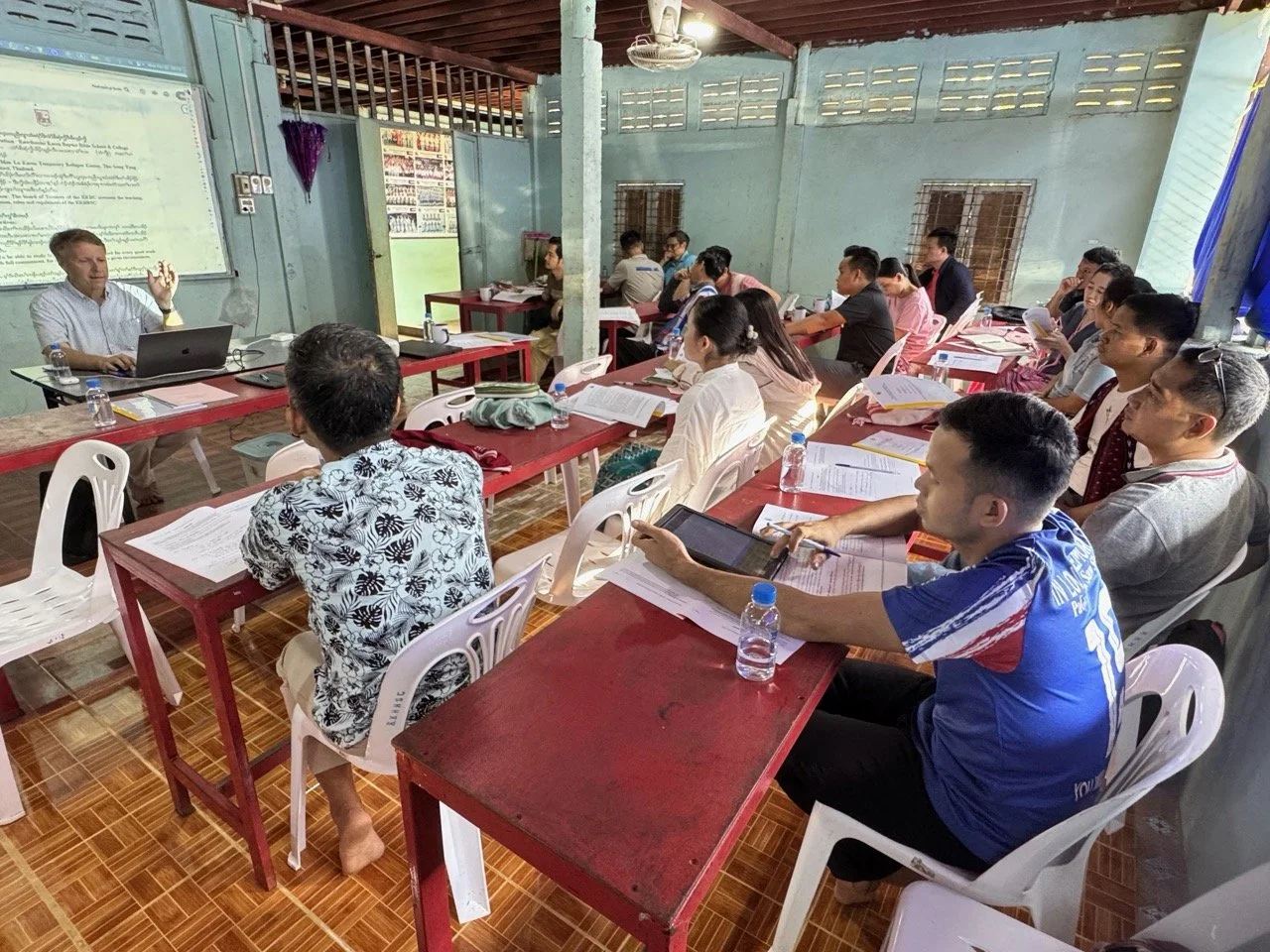 Tim and class teaching Large.jpeg