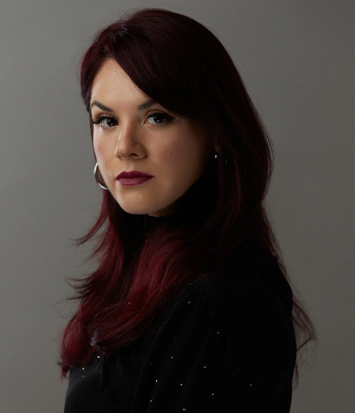 EM Roman headshot.jpg