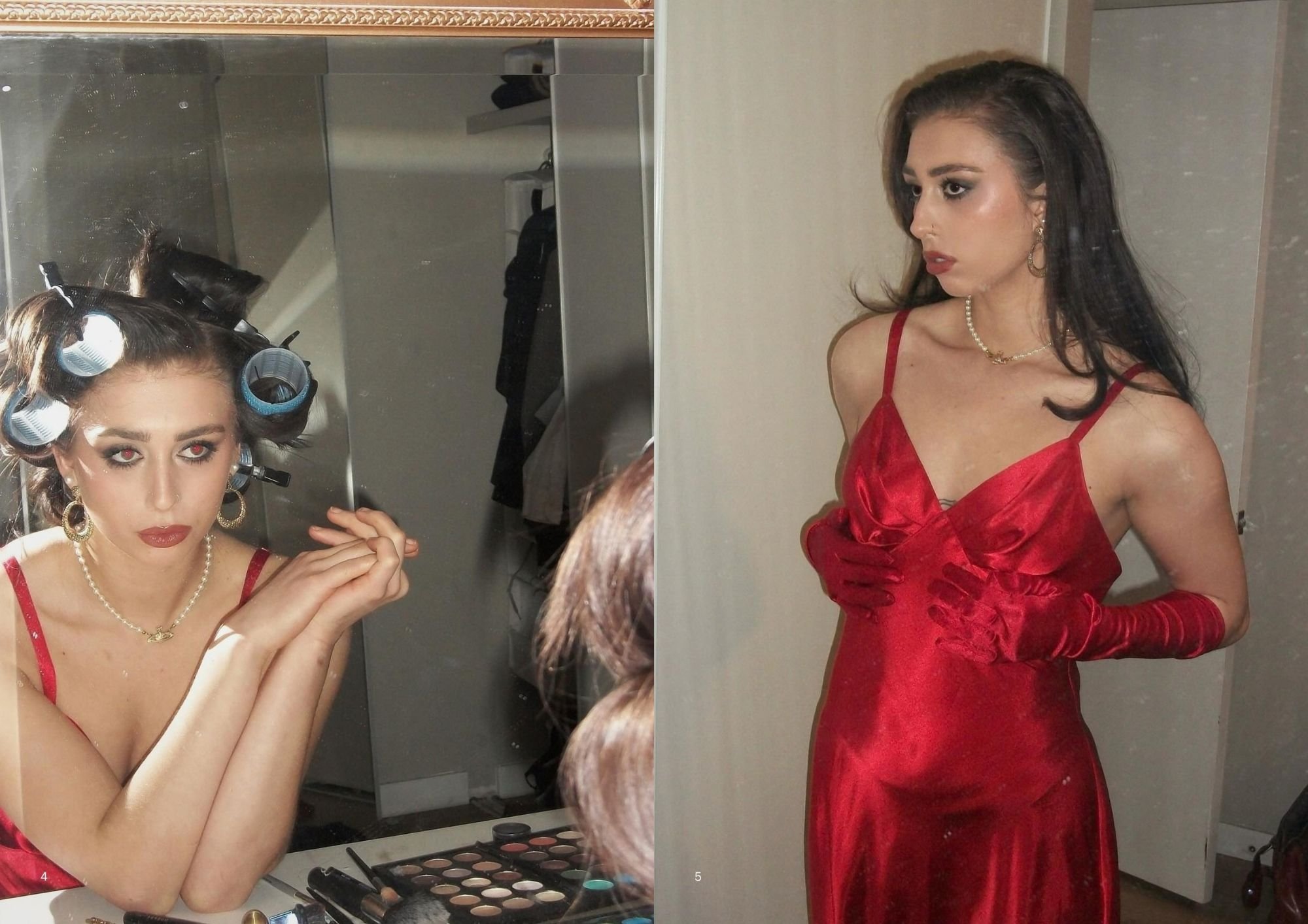 A woman is getting ready in front of a mirror, with rollers in her hair, wearing a red dress, earrings, necklace, and makeup, while a reflection shows her applying makeup.
