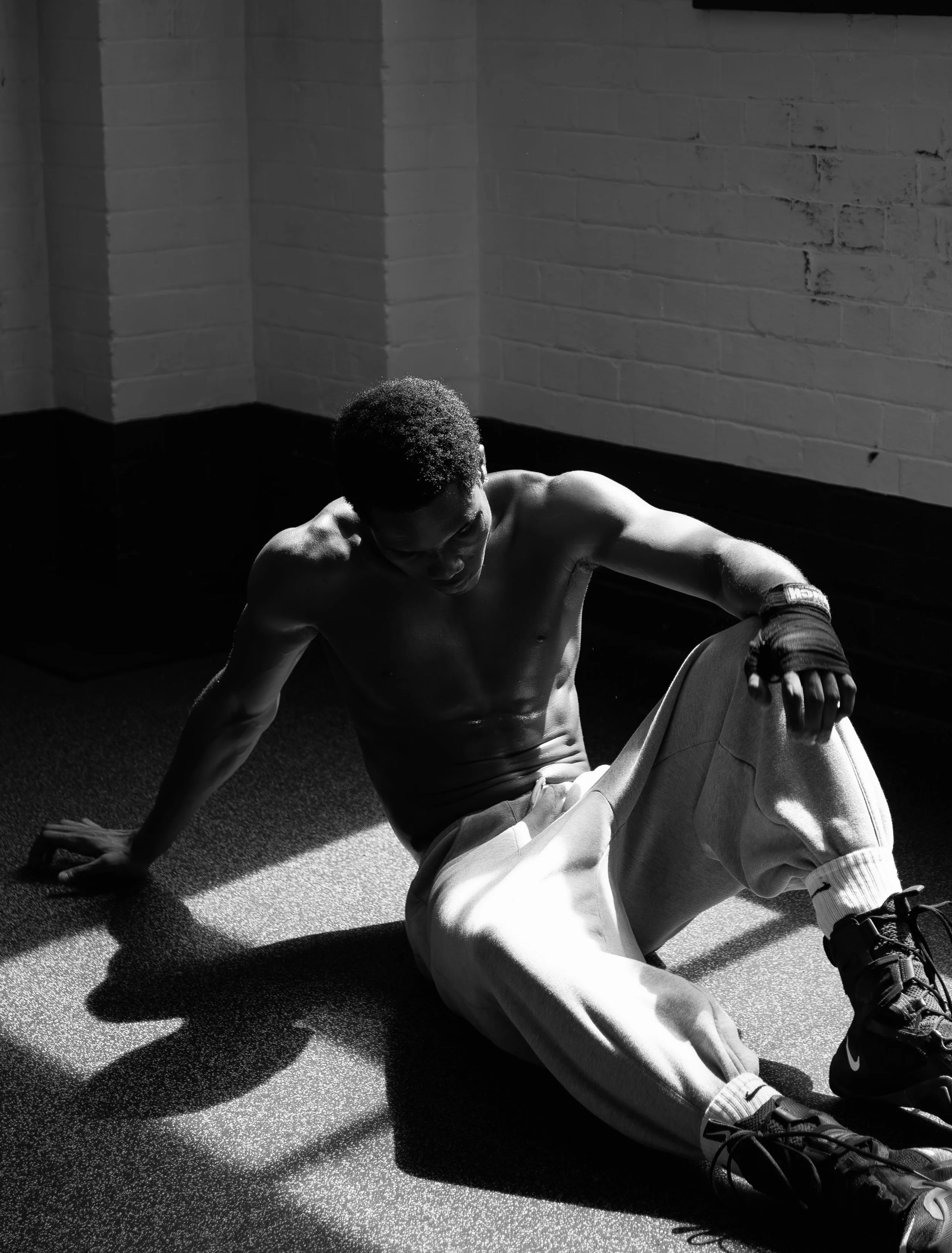 Capture-By-Grace_Beyond-the-Game_Portrait-of-Man-Boxer-Sitting.jpg