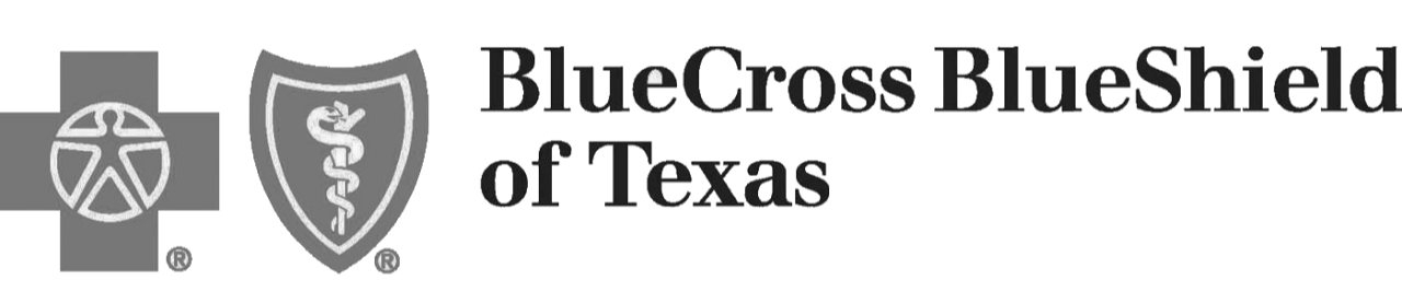 Logo of BlueCross BlueShield of Texas with a bull in front of two symbols, one resembling a shield with a serpent and the other a wheel, on a banner.