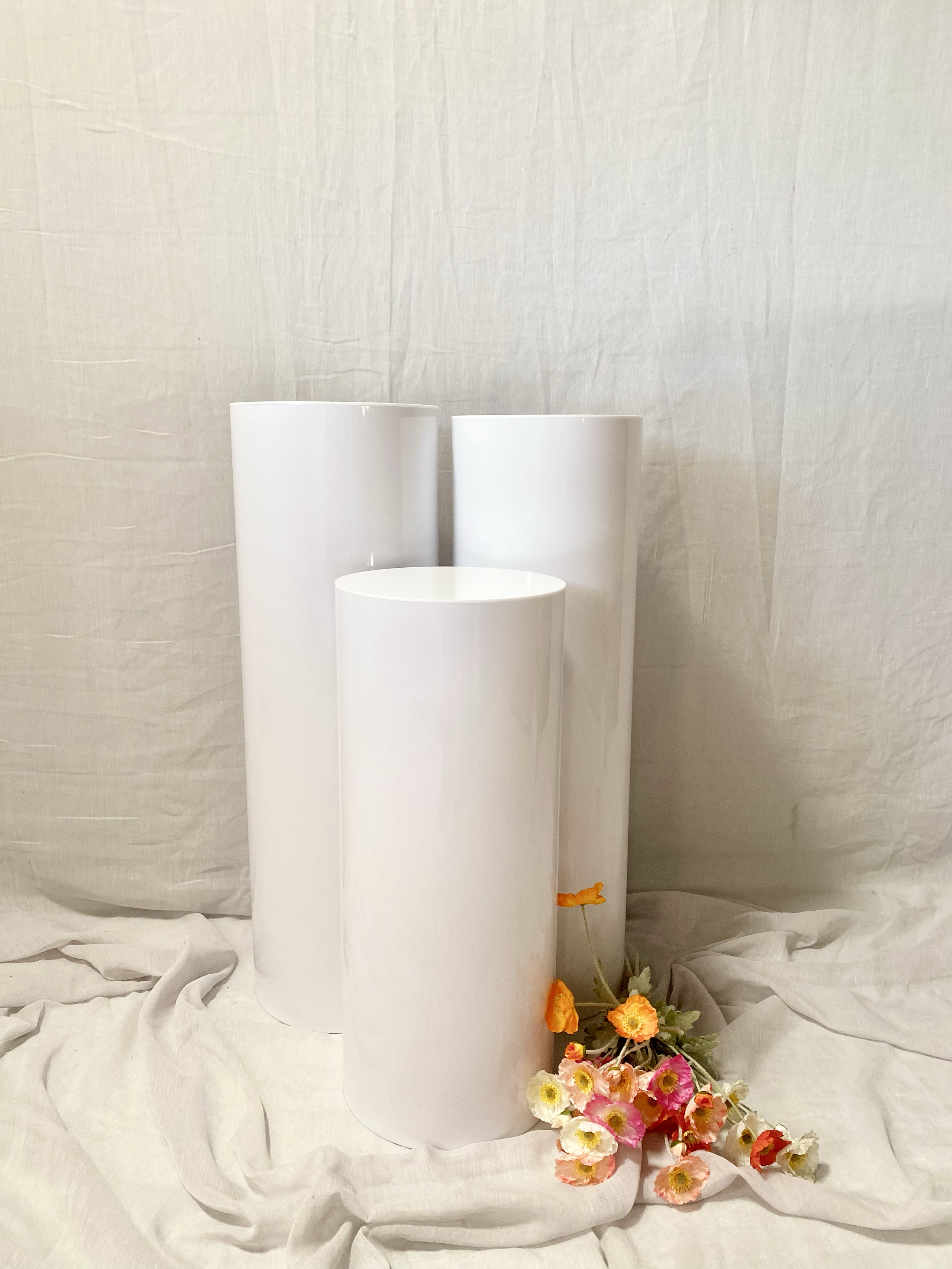 White Round Plinth Set
Hire Price: $150
Material: Acrylic 
Qty: 1 Set Available 