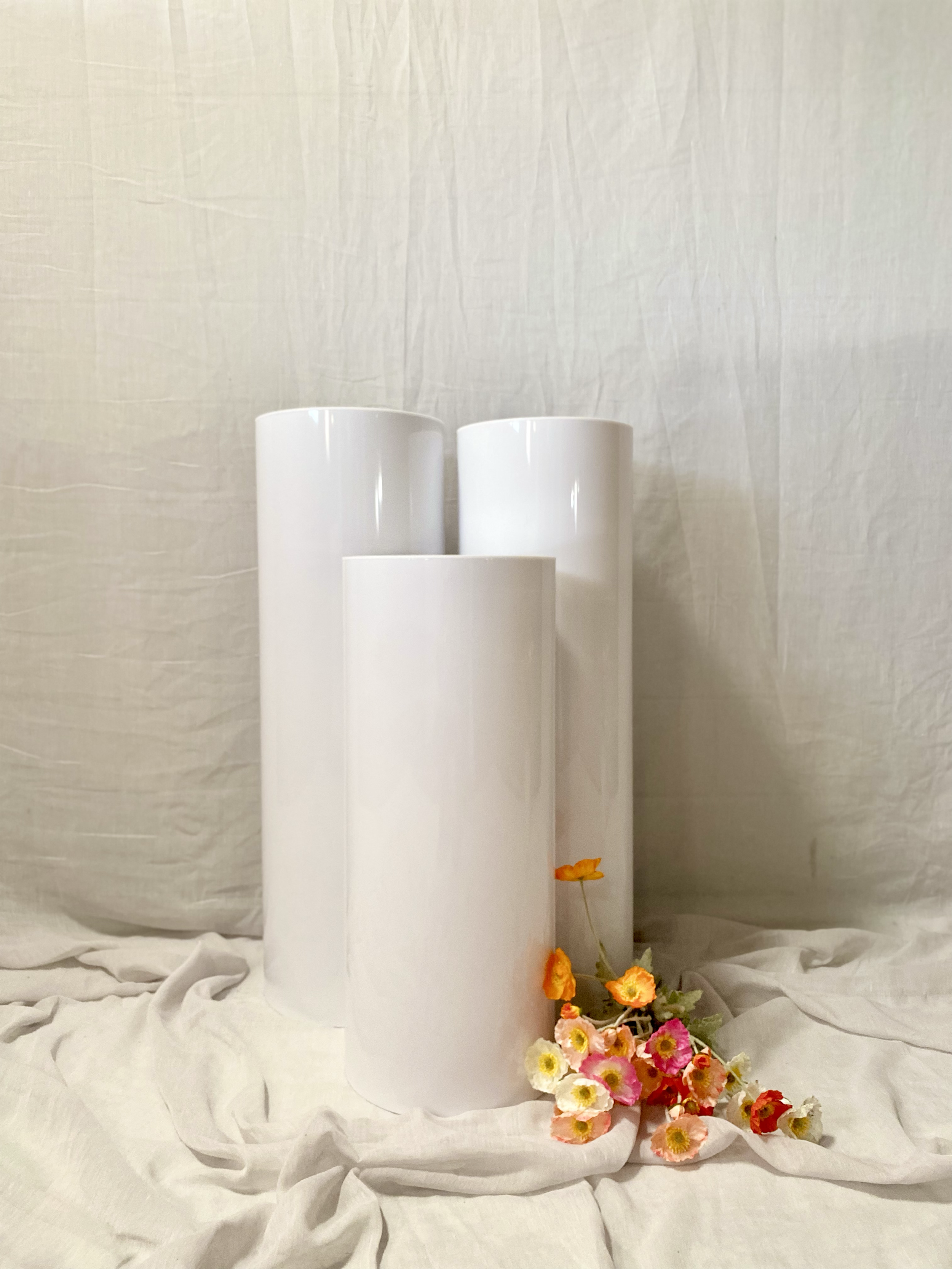 White Round Plinth Set
Hire Price: $150
Material: Acrylic 
Qty: 1 Set Available 