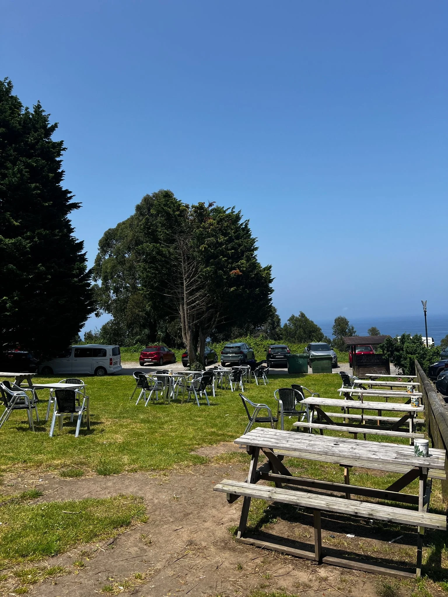 Picnic tables at the lookout in Lastres