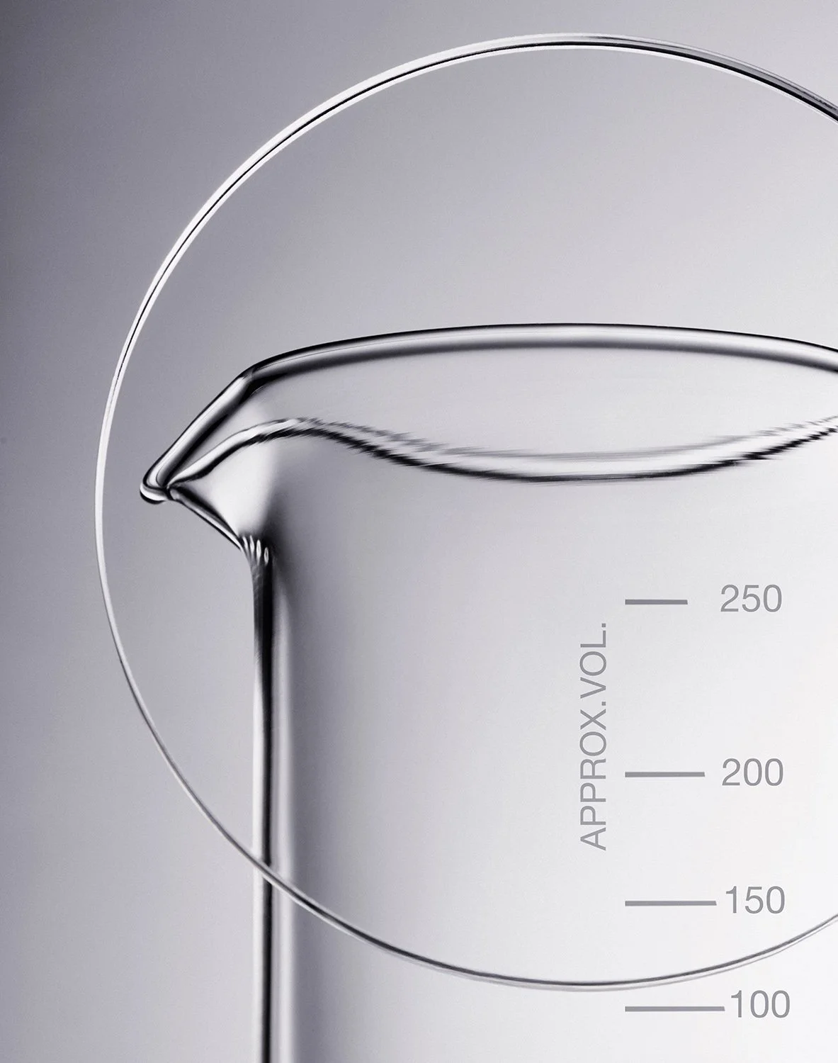 Close-up of a transparent glass laboratory measuring cylinder filled with a clear liquid, showing volume markings up to 250 milliliters.