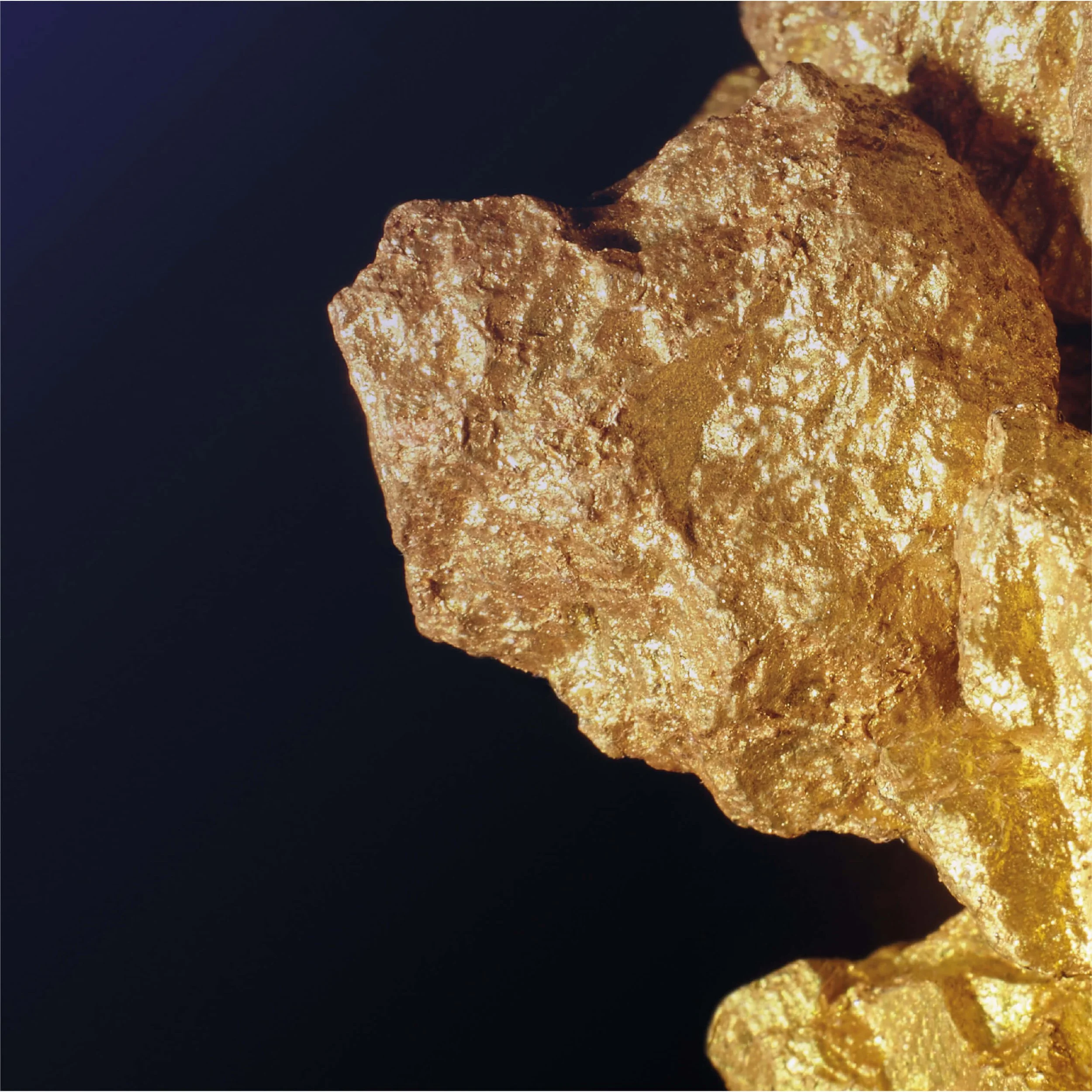 AFC Financial Report design featuring a high-contrast macro image of raw gold nuggets. Premium sector-specific imagery selected to highlight investment opportunities in African mining and natural resources.