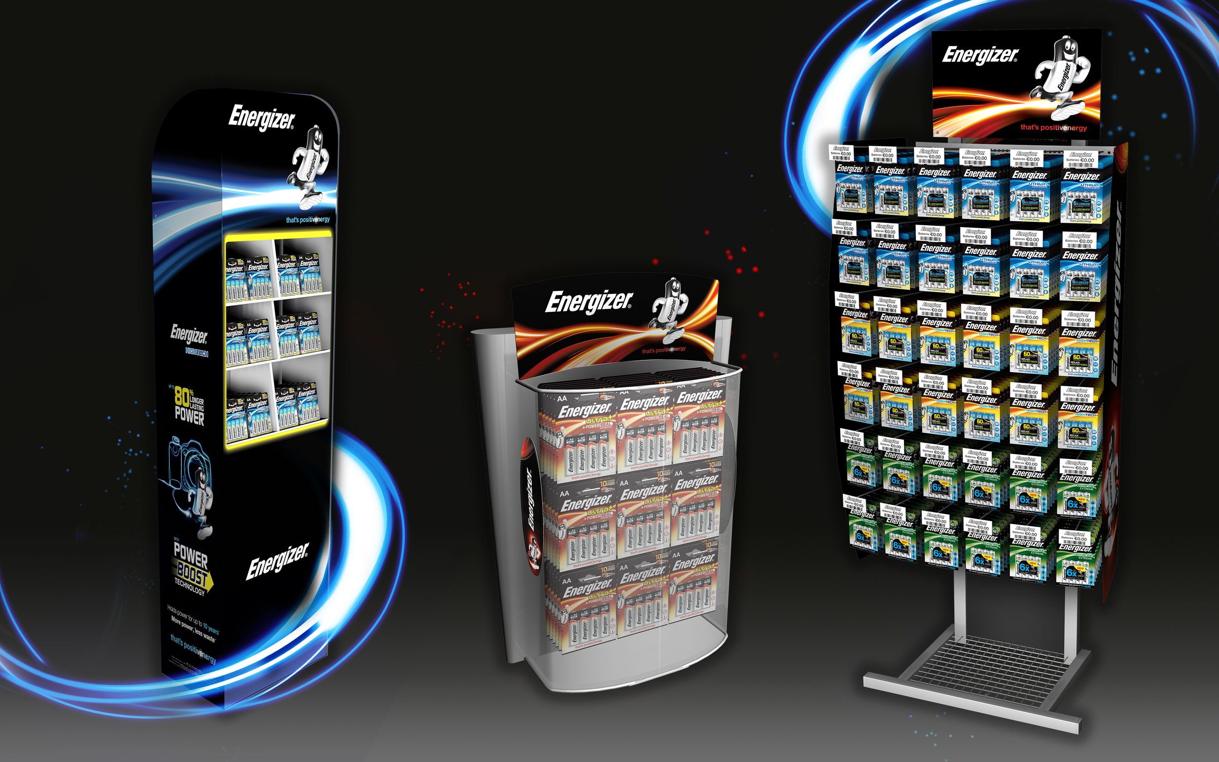 Display stands with Energizer batteries, including AA, AAA, and 6V varieties, on a black background with illuminated blue and white swirl graphics.