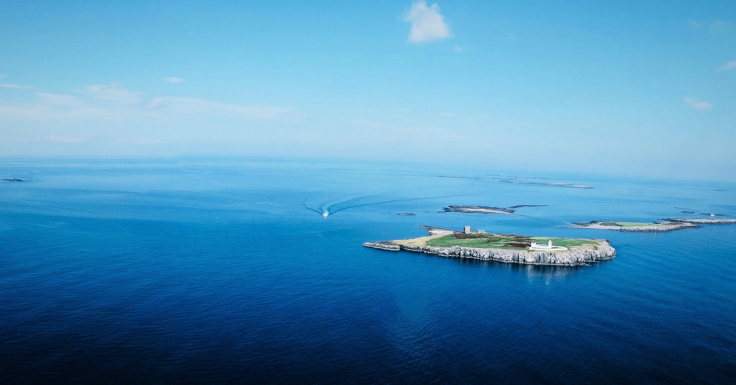 Stunning Farne Islands off the Northumberland coast near Seahouses, famous for puffins, grey seals and spectacular seabird colonies. Enjoy unforgettable wildlife boat trips during your stay at Old Stable House holiday cottage in Chatton.
