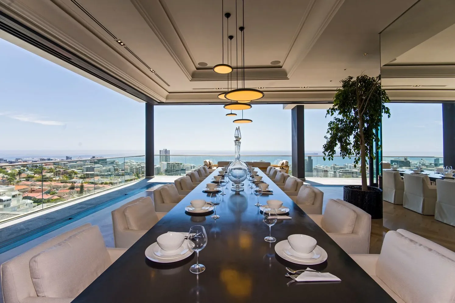 image of the 18 seat dining area at the Cape Town Penthouse Villa For Sale