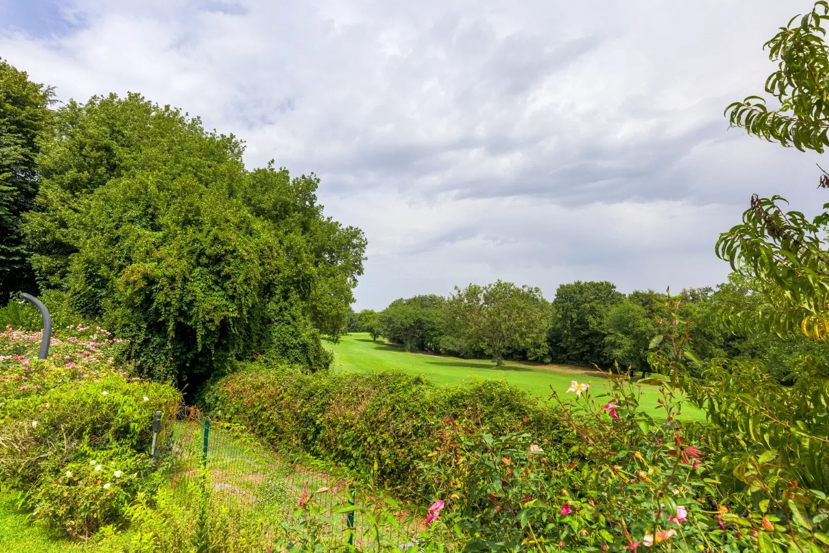 image of the gardens at the Rome villa for sale