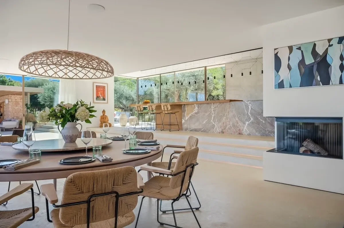 an image o one of the luxury dining areas at the Cala Bassa villa in Saint Josep