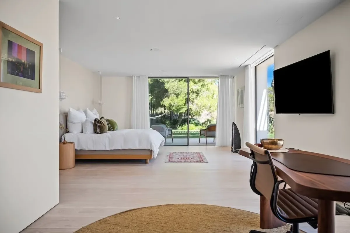 image of one of the modern luxurious bedrooms on the Cala Bassa luxury estate in Saint Josep Ibiza