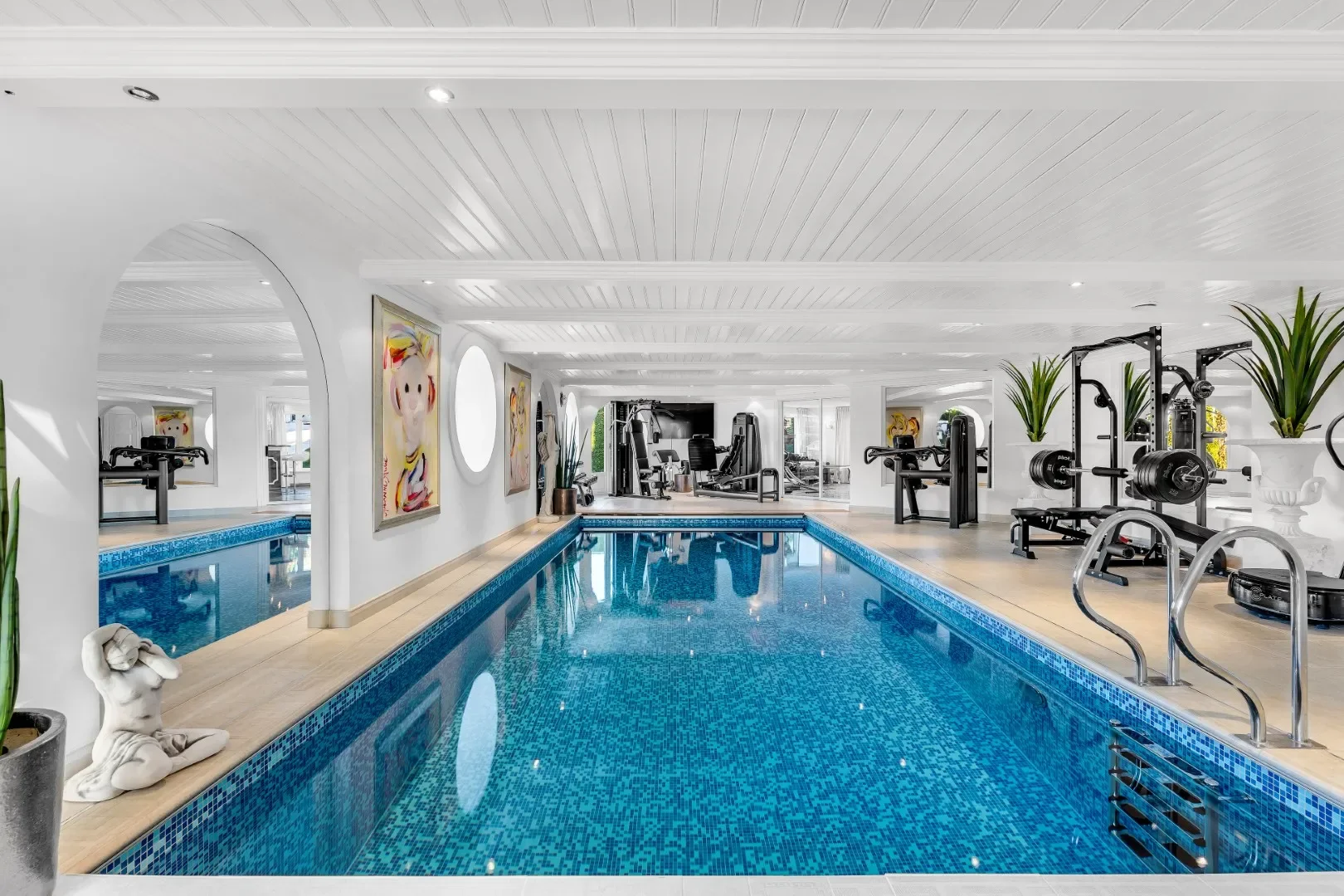 image of the large indoor pool at the luxury villa for sale in Oslo