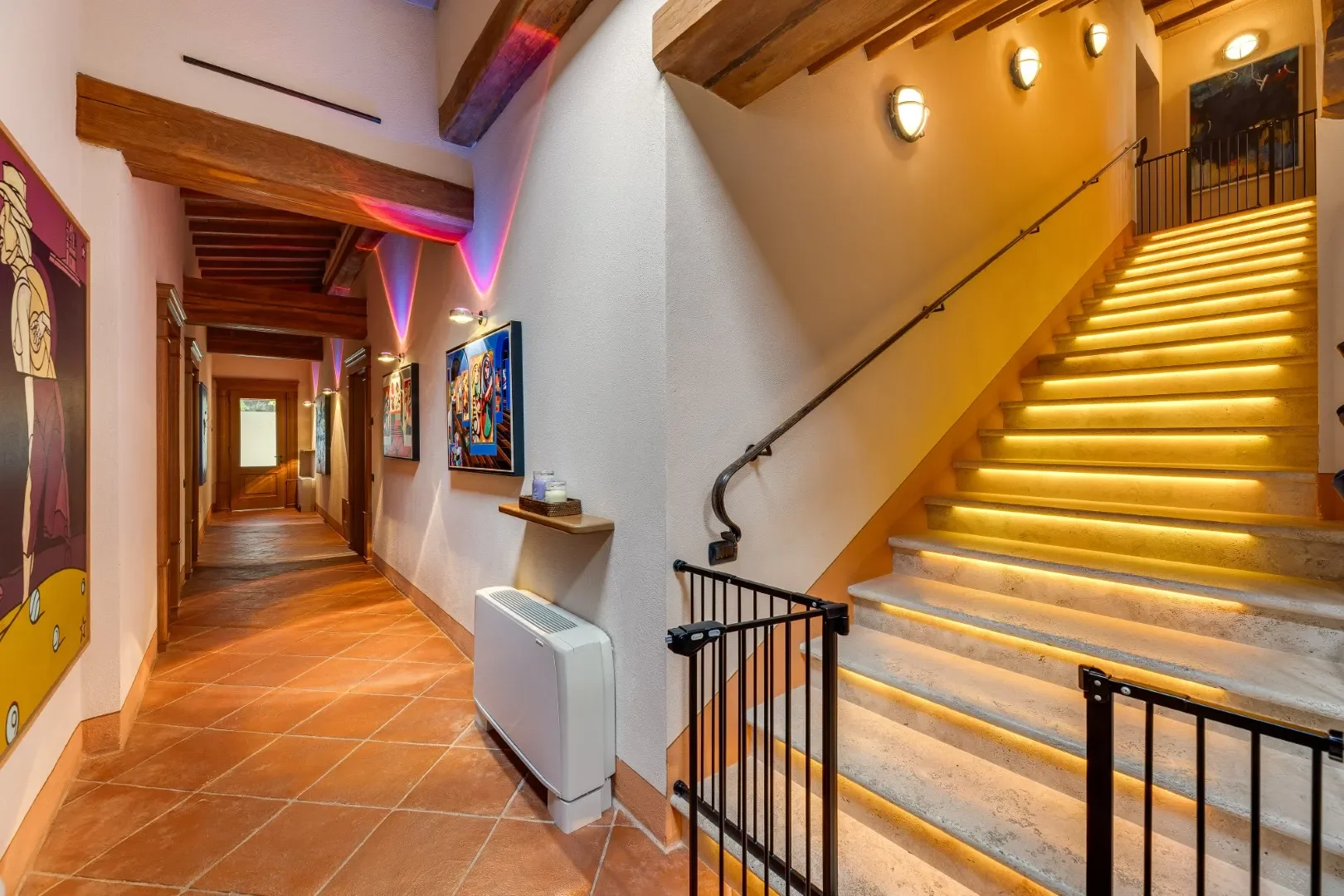 image of the roman style staircase at the Rome villa for sale