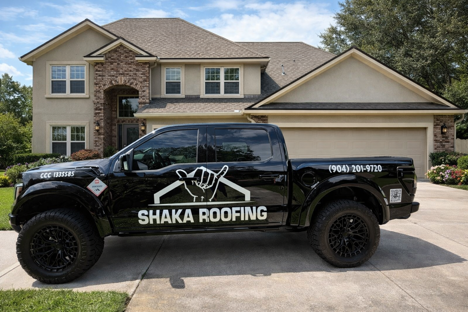 Truck in front of shingle home.png