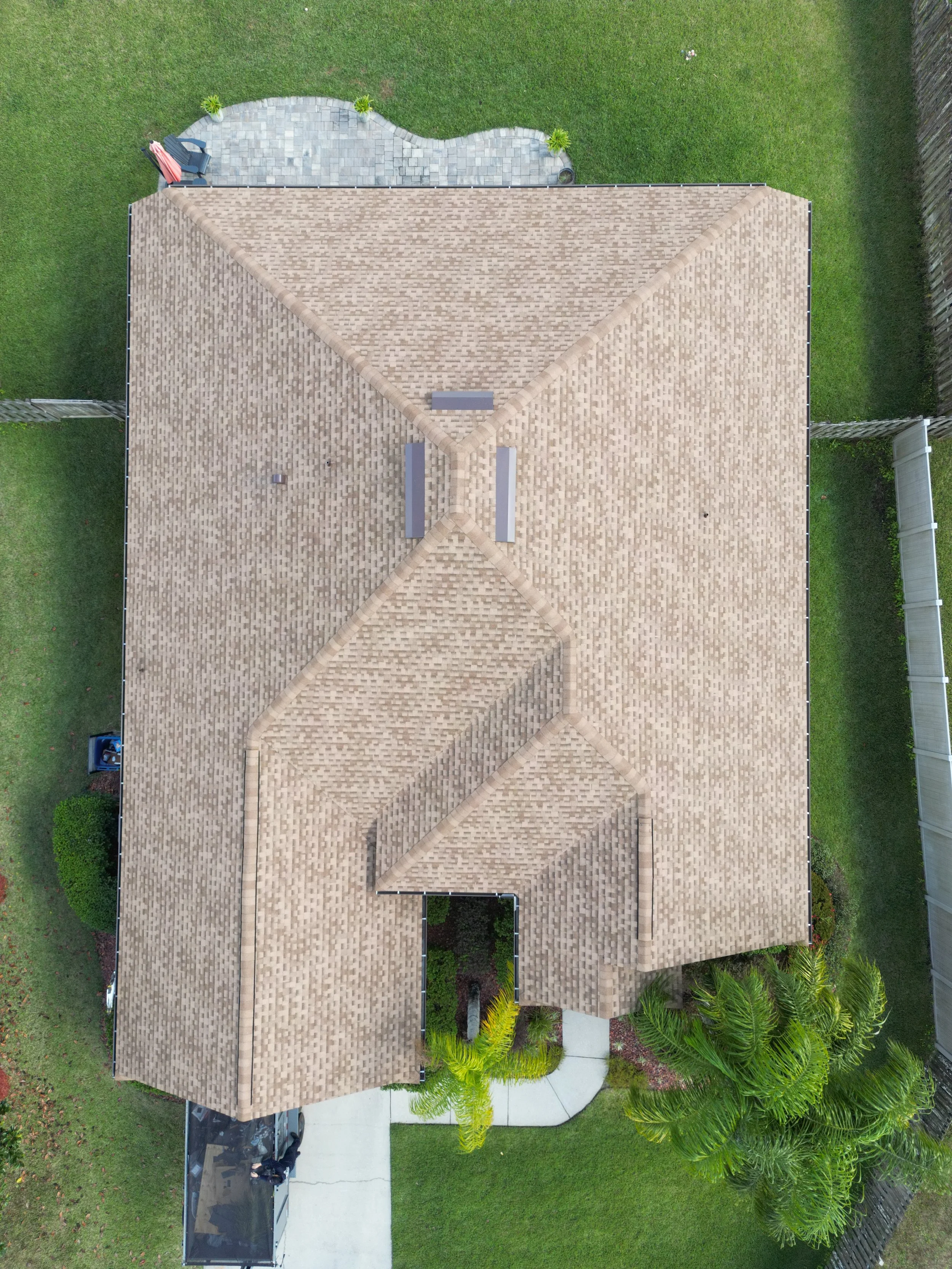 Hail damaged roof with successful insurance pay out replaced by Shaka Roofing. 