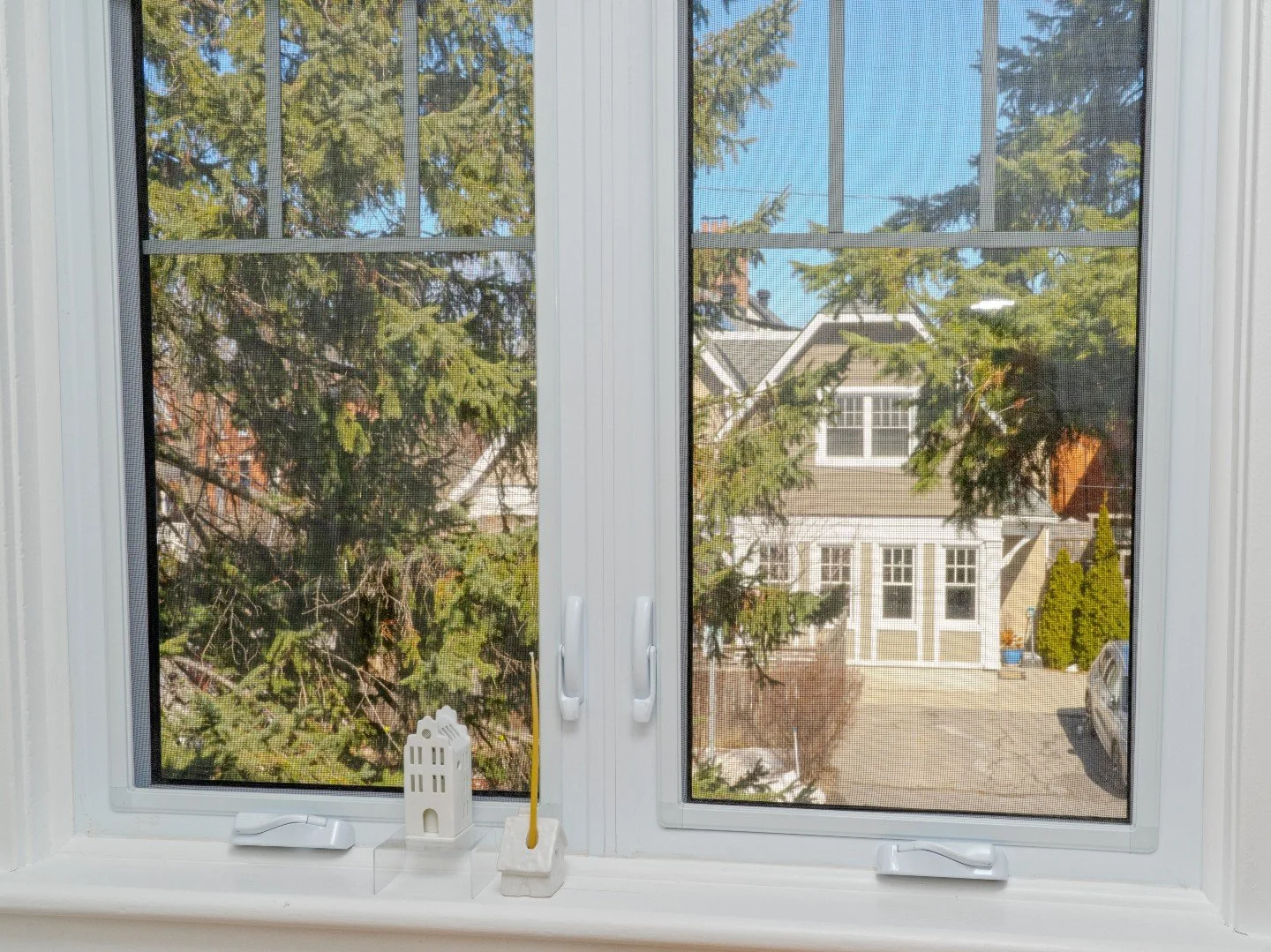 While visiting a recently completed project, we spotted this familiar house across the street...

Completed in 2014, this 2 storey addition was built in the corner side yard to enhance the curb appeal and provide additional living space with an abund
