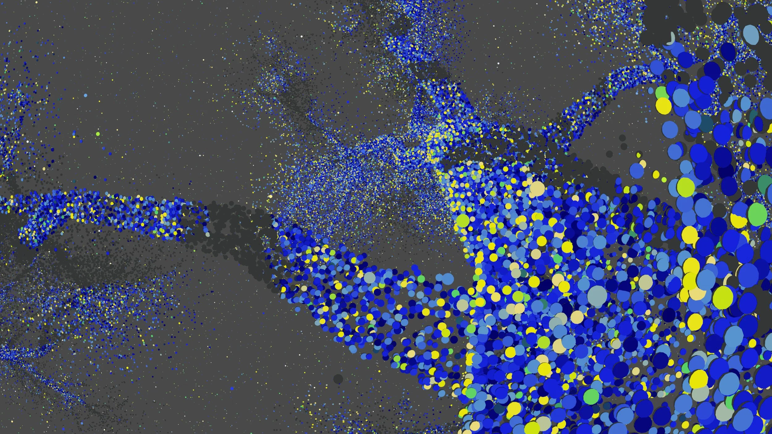 Abstract image featuring a dense pattern of overlapping colorful dots in shades of blue, yellow, and green against a dark background.