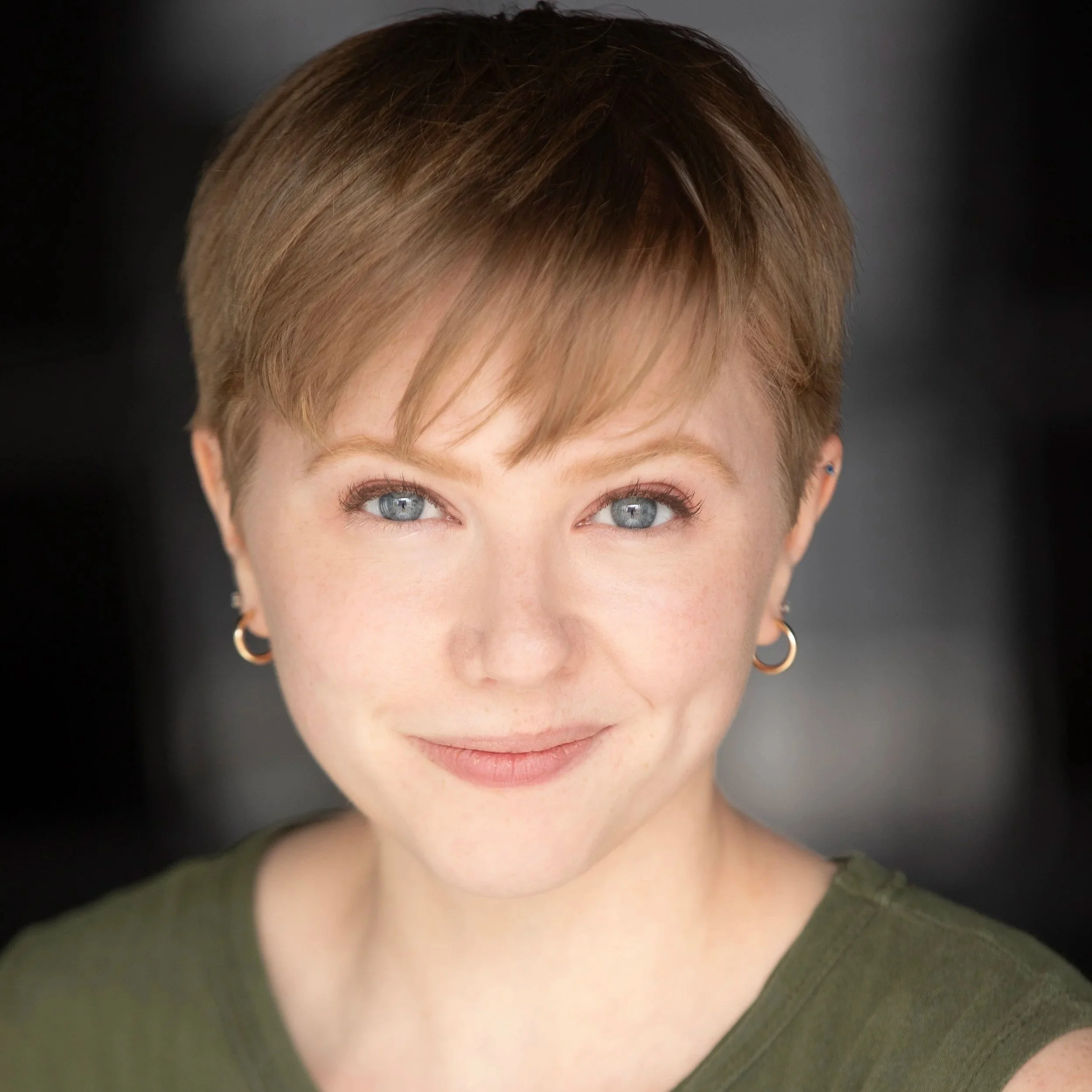 Schmitz Headshot 2024- green.jpg