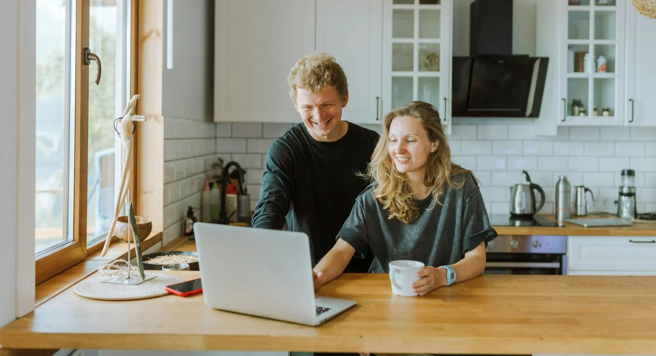 Homeowners at their kitchen table