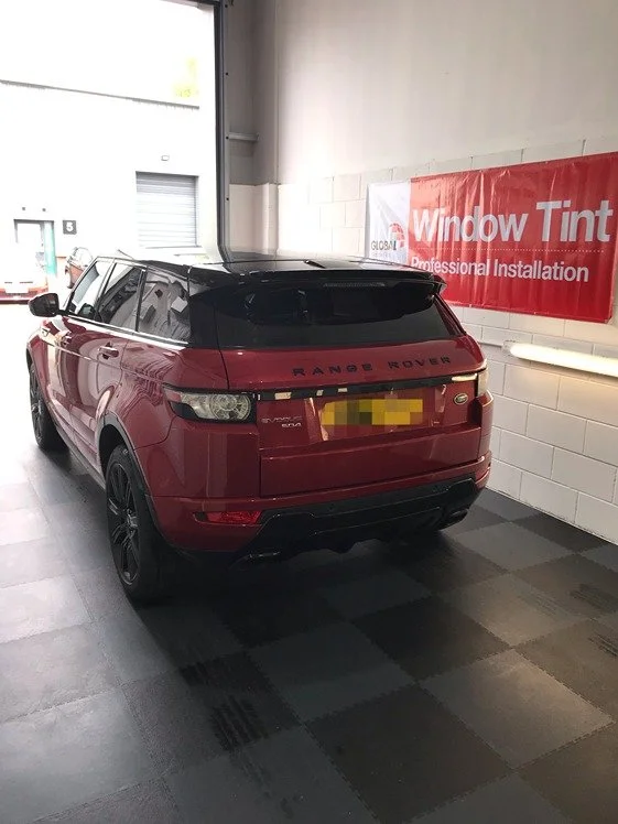 Red Range Rover tinted at Direct Window Tints near Lincoln