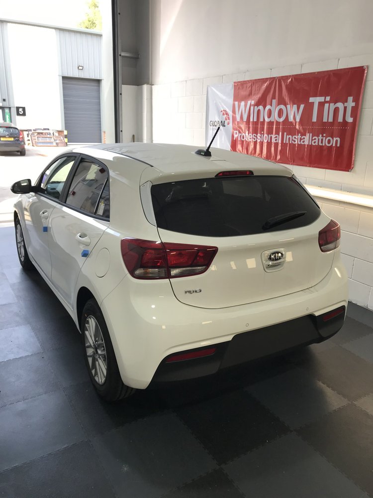 White car with rear window tint