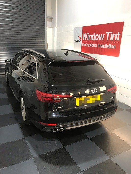 Black Audi being tinted at Direct Window Tints near Lincoln