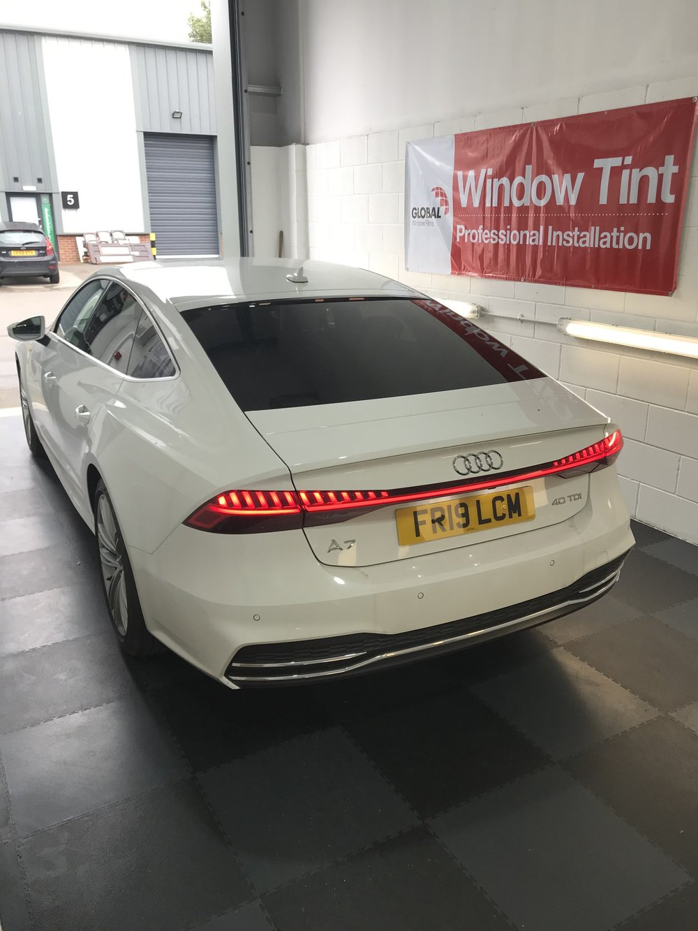 Window tint being applied in Lincoln