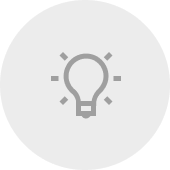 Pictogram van een gloeilamp op een grijze achtergrond.