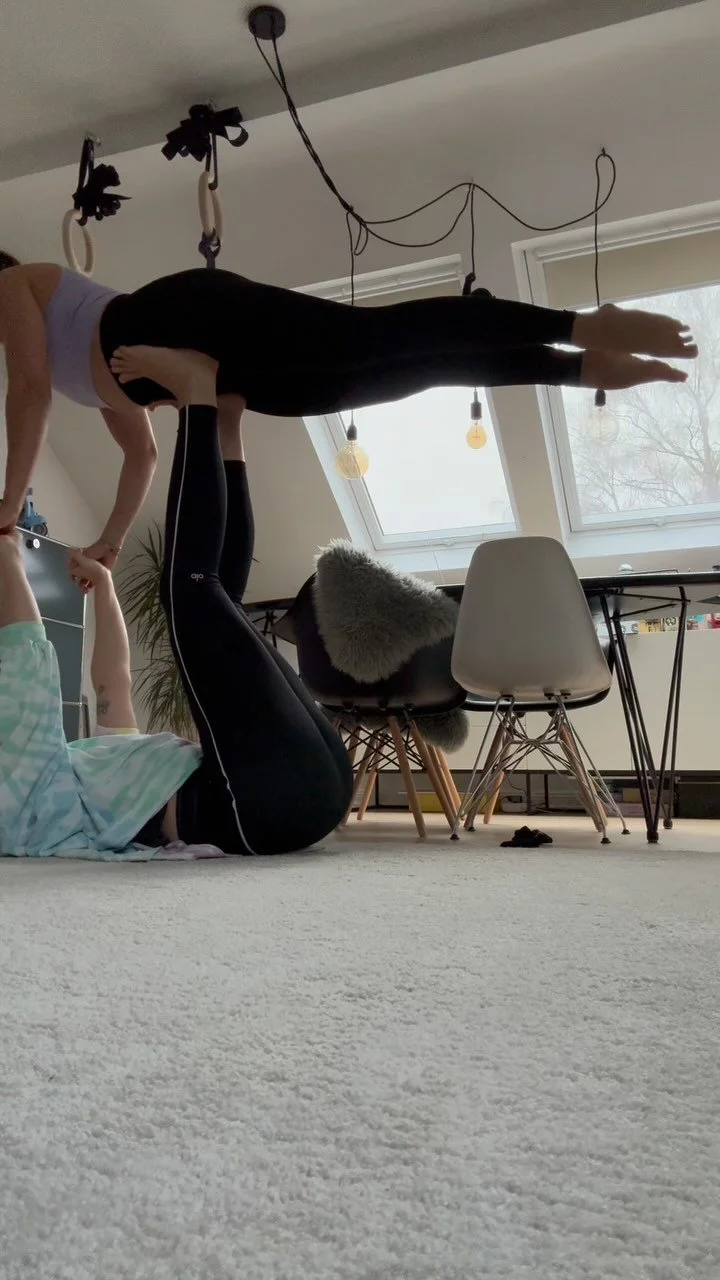 Best yoga buddies who lift each other up… and drop each other down 😂🤍🤸🏼‍♀️ #acroyoga #yogapractice #yogaeverydamnday