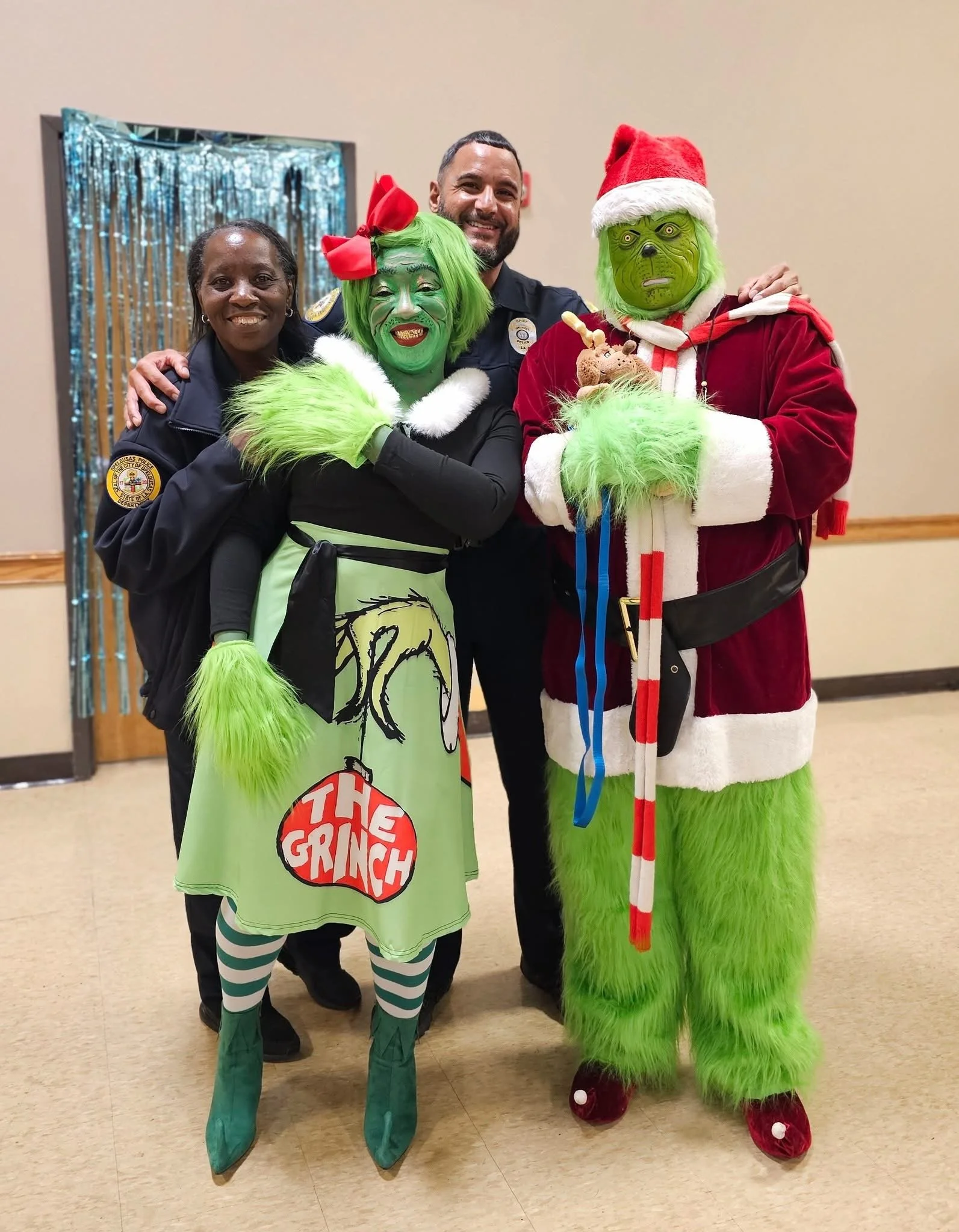Mr. Grinch (Sgt. Peterson) & Ms. Grinch (Pfc. Lewis) paying a visit to Opelousas. Including Lt. Tyler & Chief LeBlanc